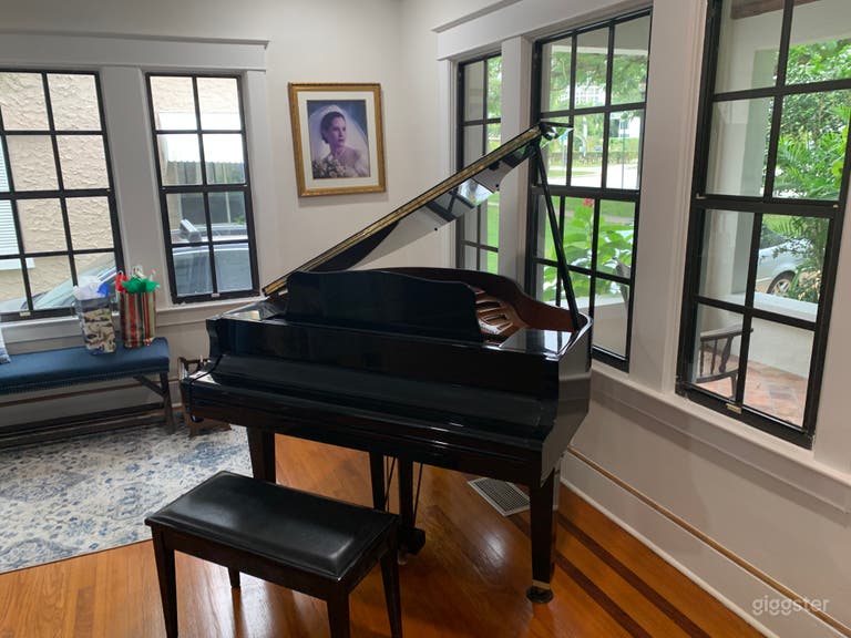  Living Room near entrance with beautiful views of foliage in front yard 