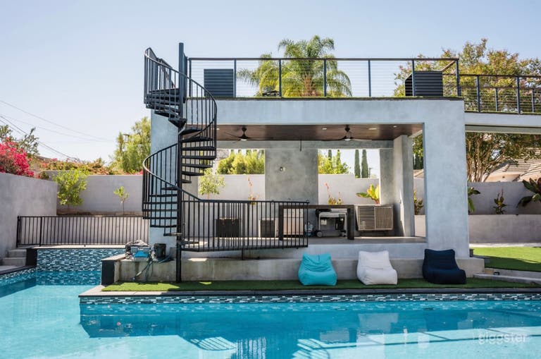  We have a spiral staircase leading to an upper level firepit area.  