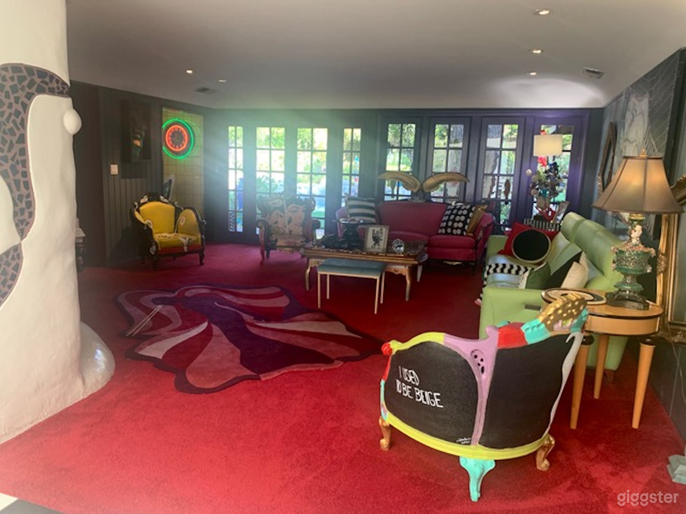 You can see the dramatic LIVING ROOM here from the front room. This room has lots of natural lights with floor to ceiling French Doors.