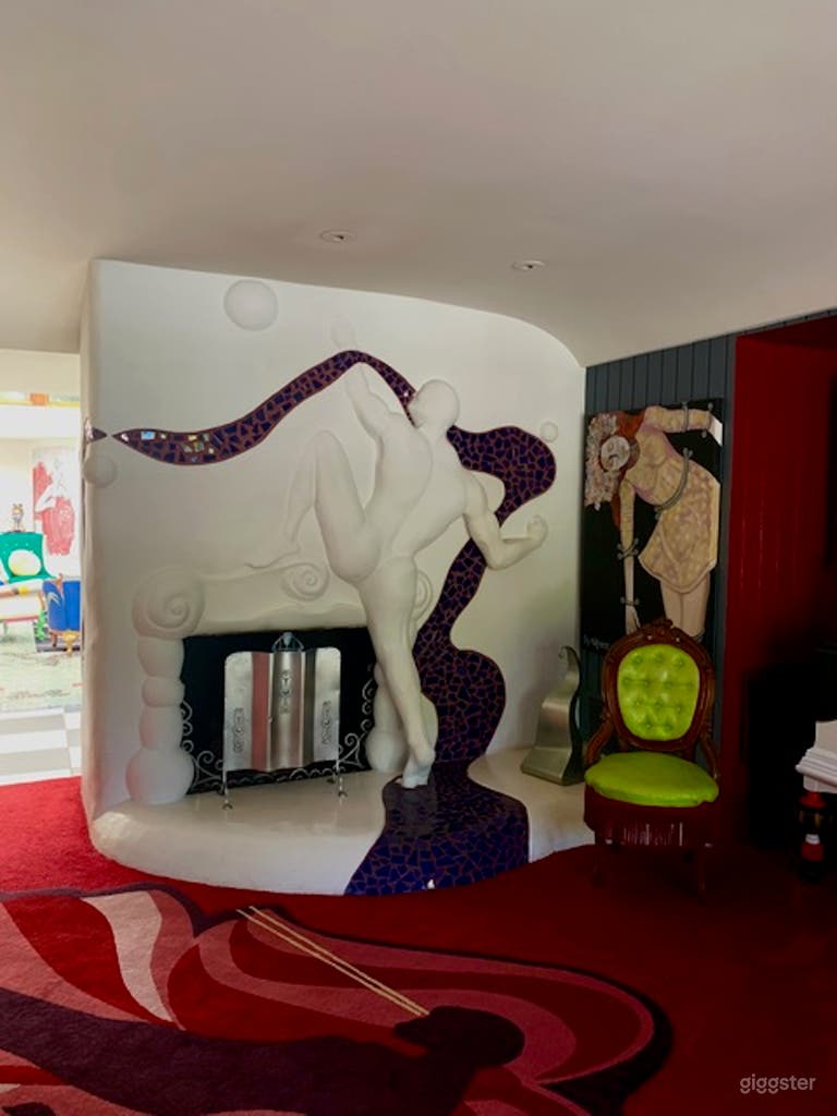  This LIVING ROOM fireplace is a bold work of art in itself! 