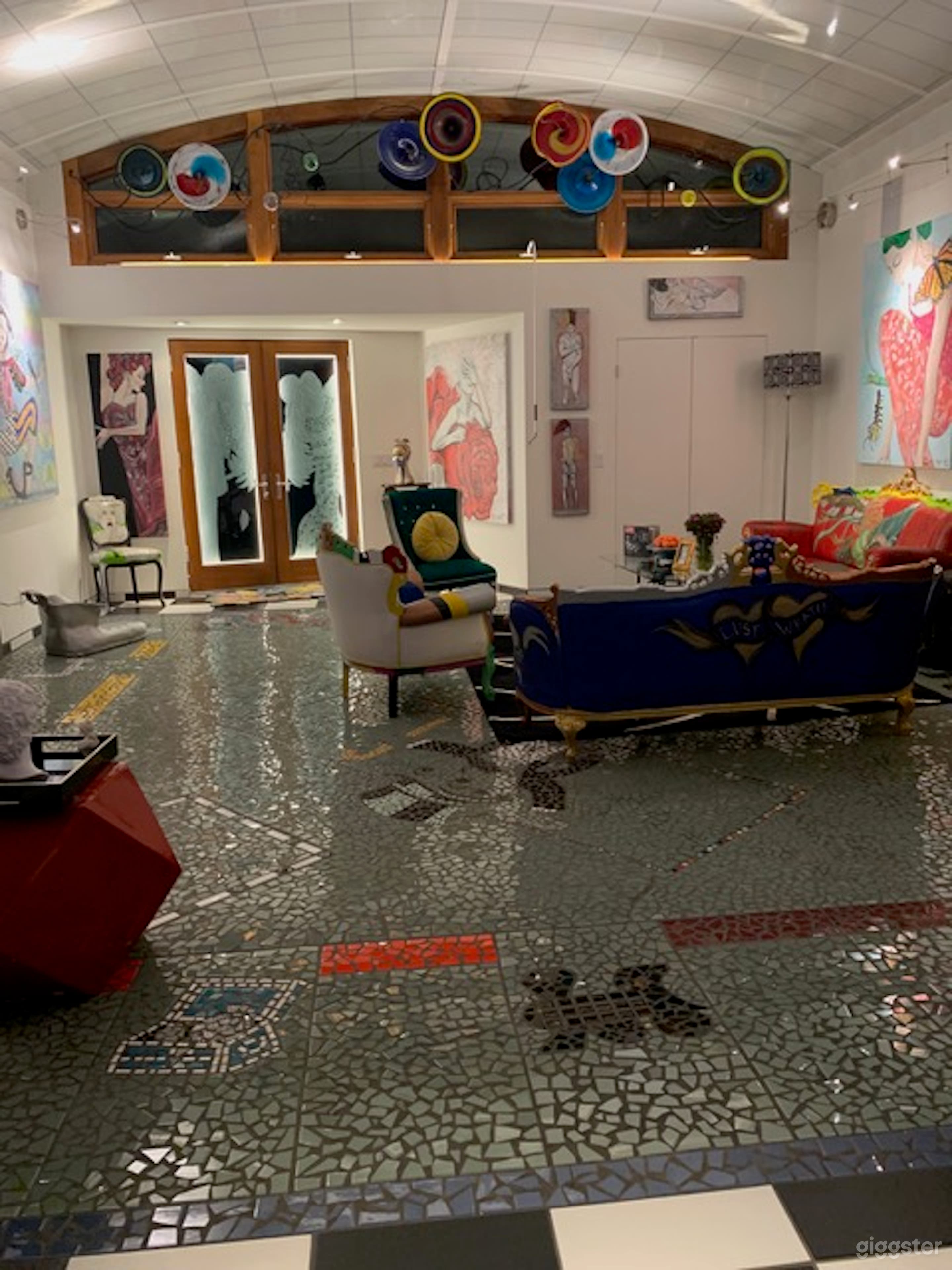 The elaborate floor tile in the FRONT ROOM actually mimics a Monopoly Board.