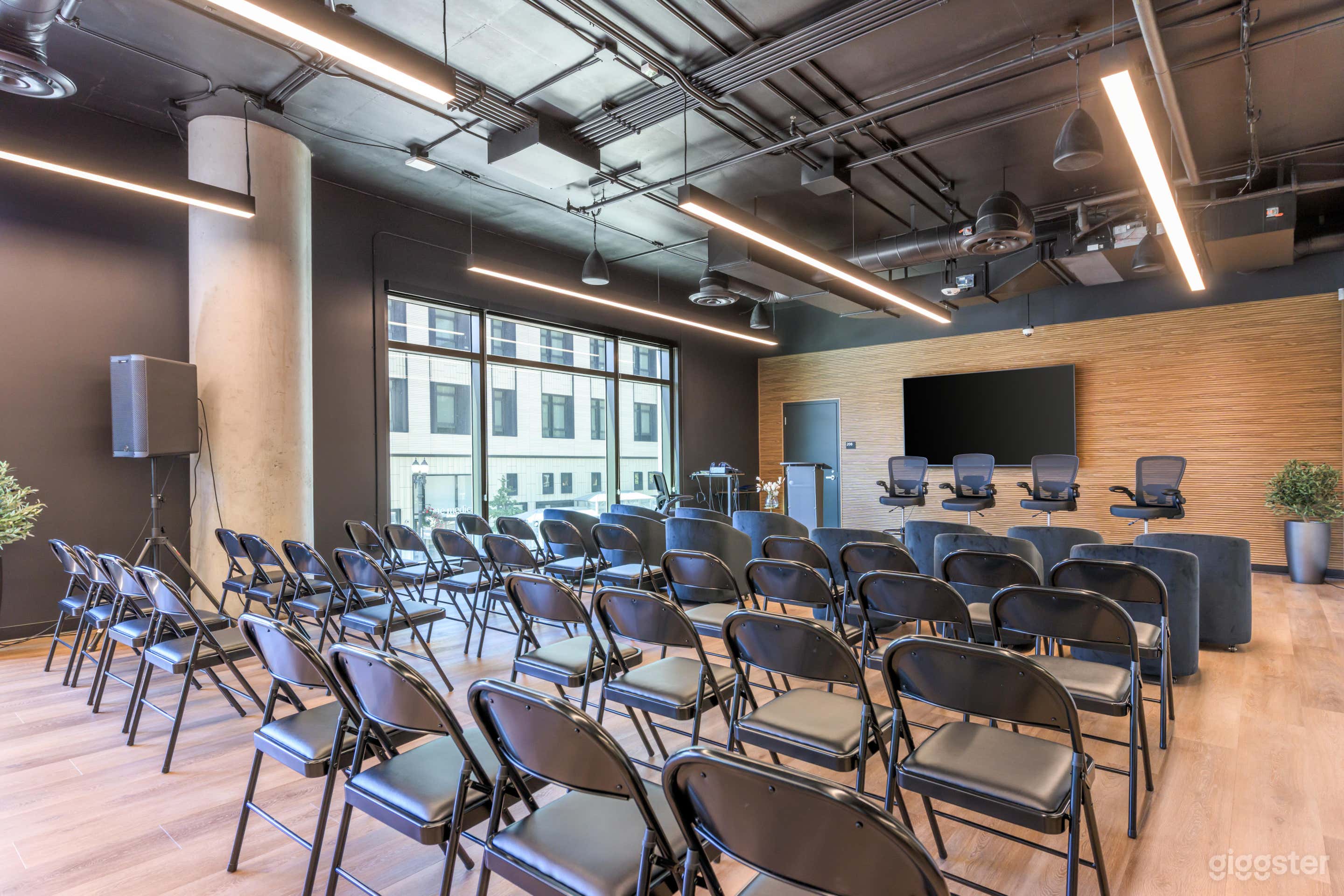 Modern Downtown Event Floor with Theater Seating &amp; Games Photo 1