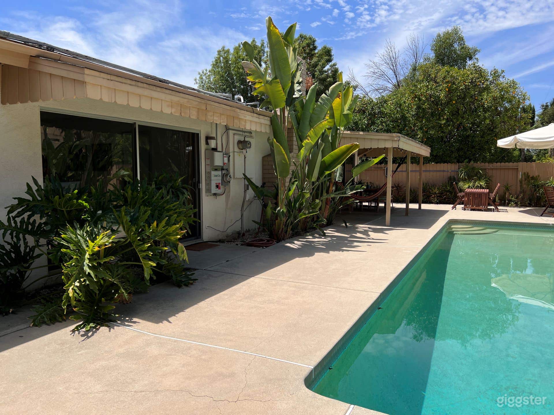 pool view facing west towards bedroom 1 sliding door