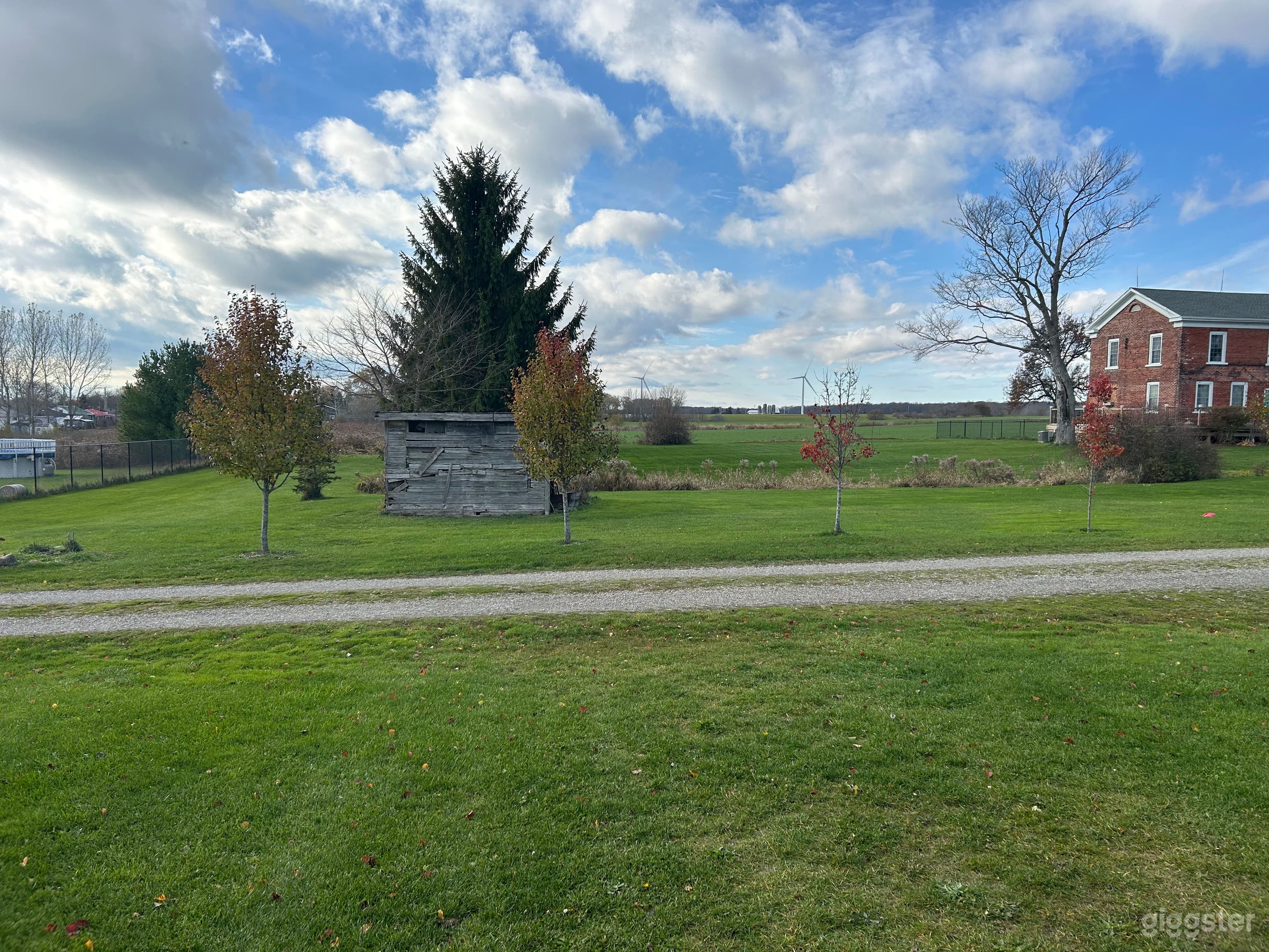 Country Backyard with Scenic Fields Photo 1