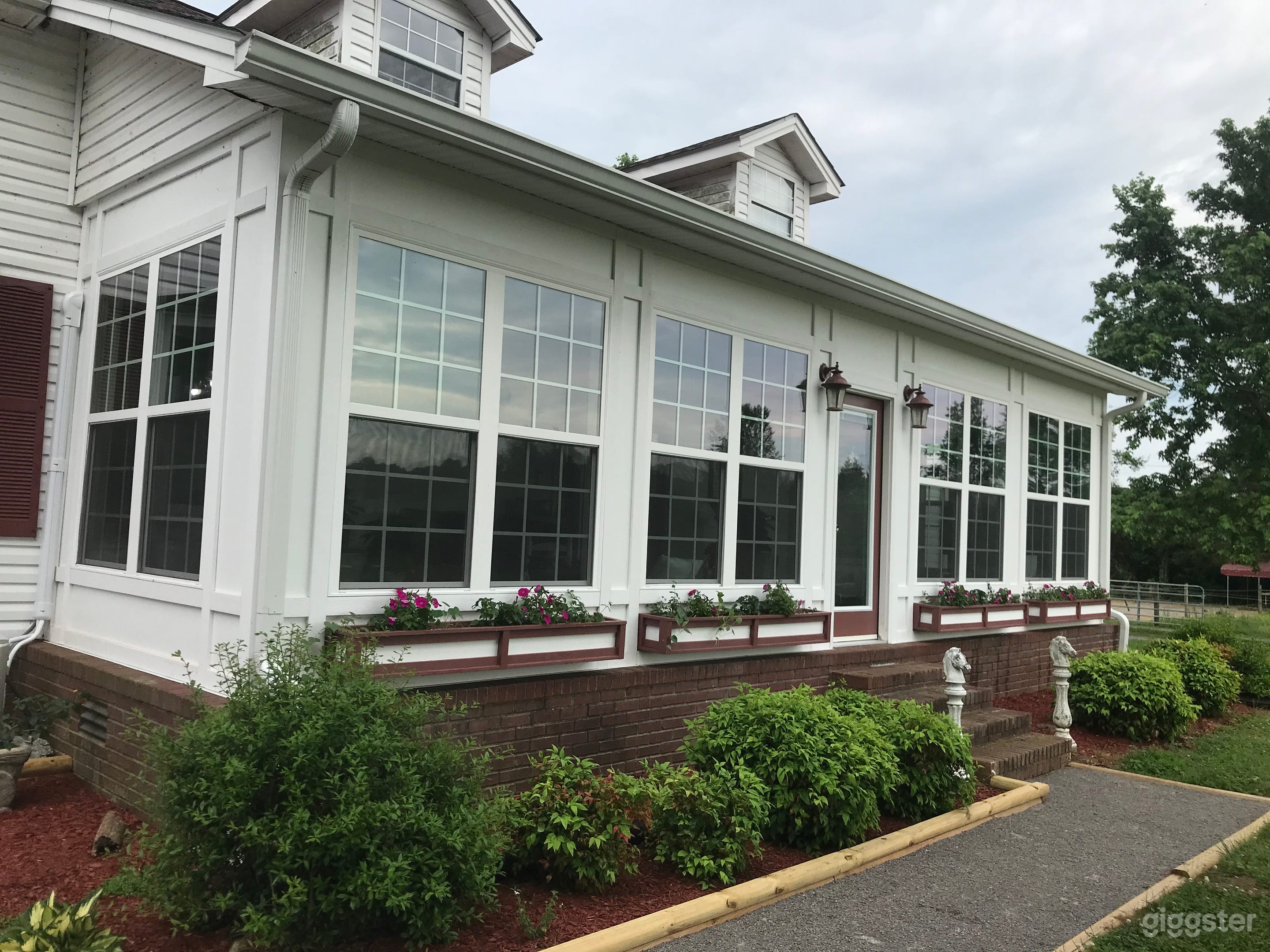 Sunroom window boxes decorated seasonally