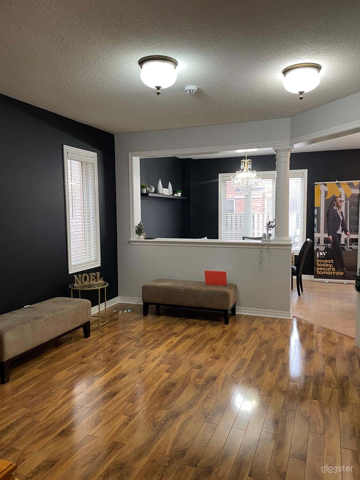 Living space looking into the dining and kitchen