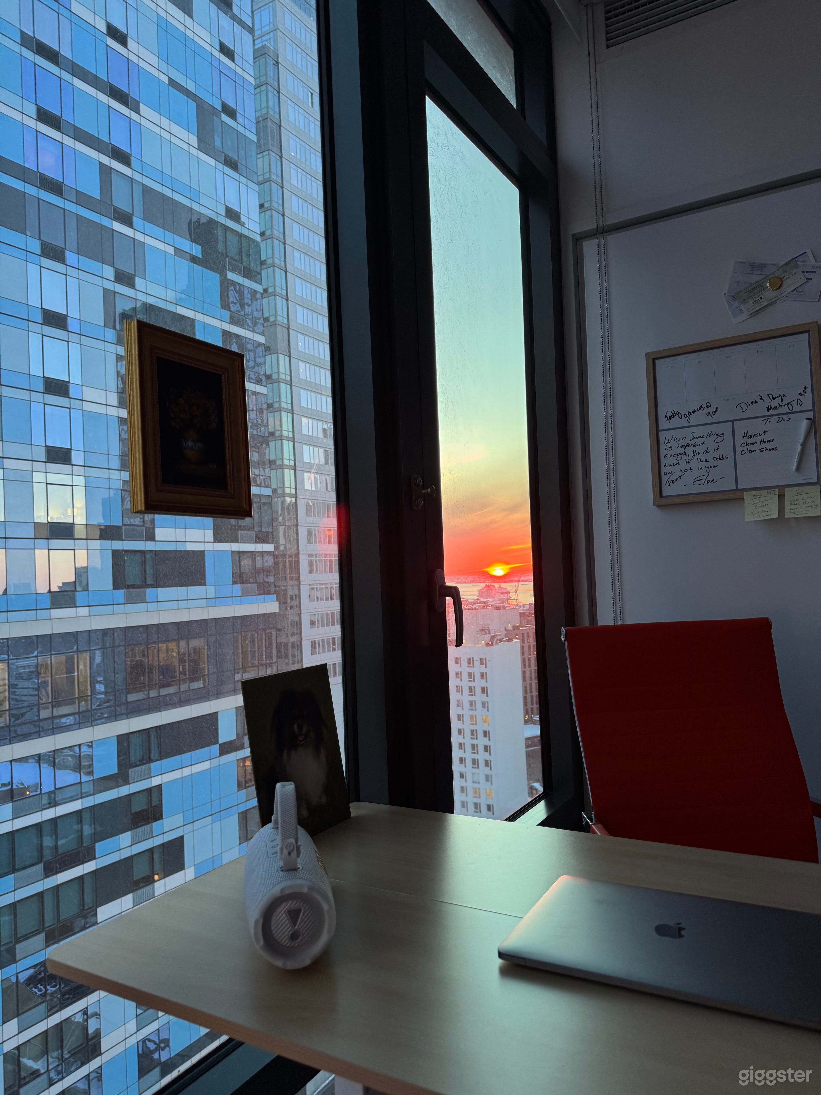 Modern studio with ocean-view sunsets and floor-to-ceiling windows. Bright, clean, and perfect for photo and video shoots. Bed, table, and couch can be moved to create an open production space.