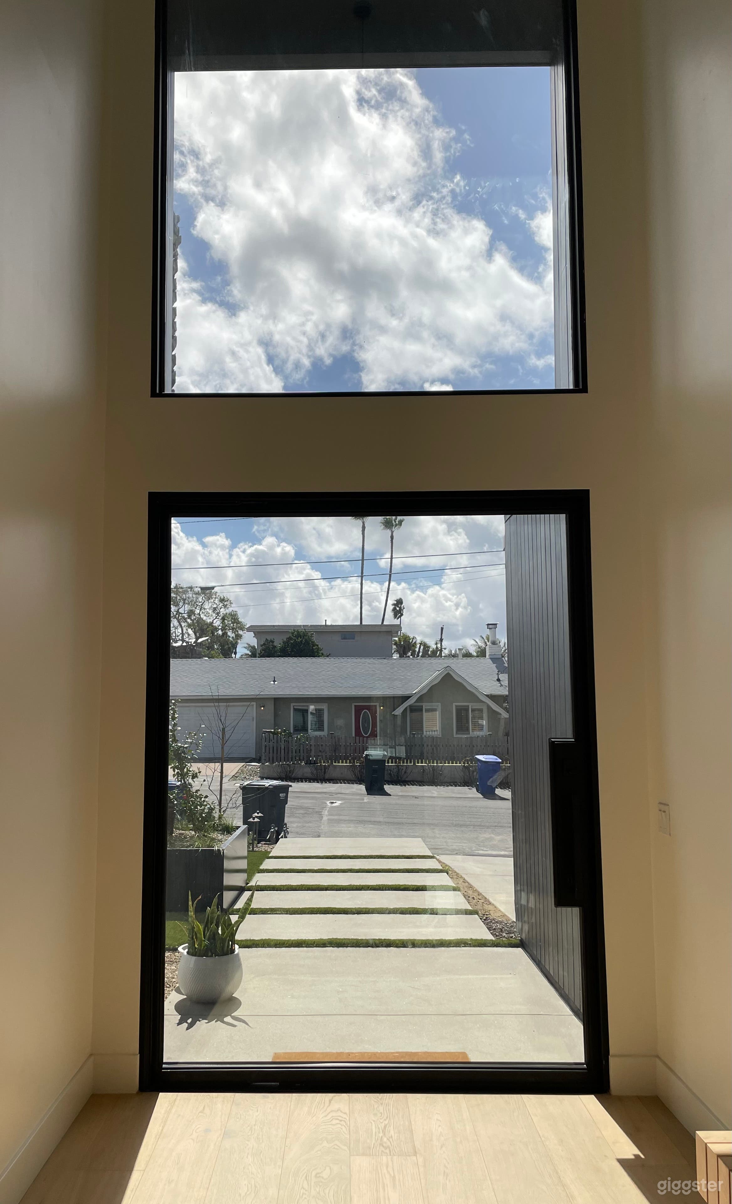 Two story Glass Pivot door 