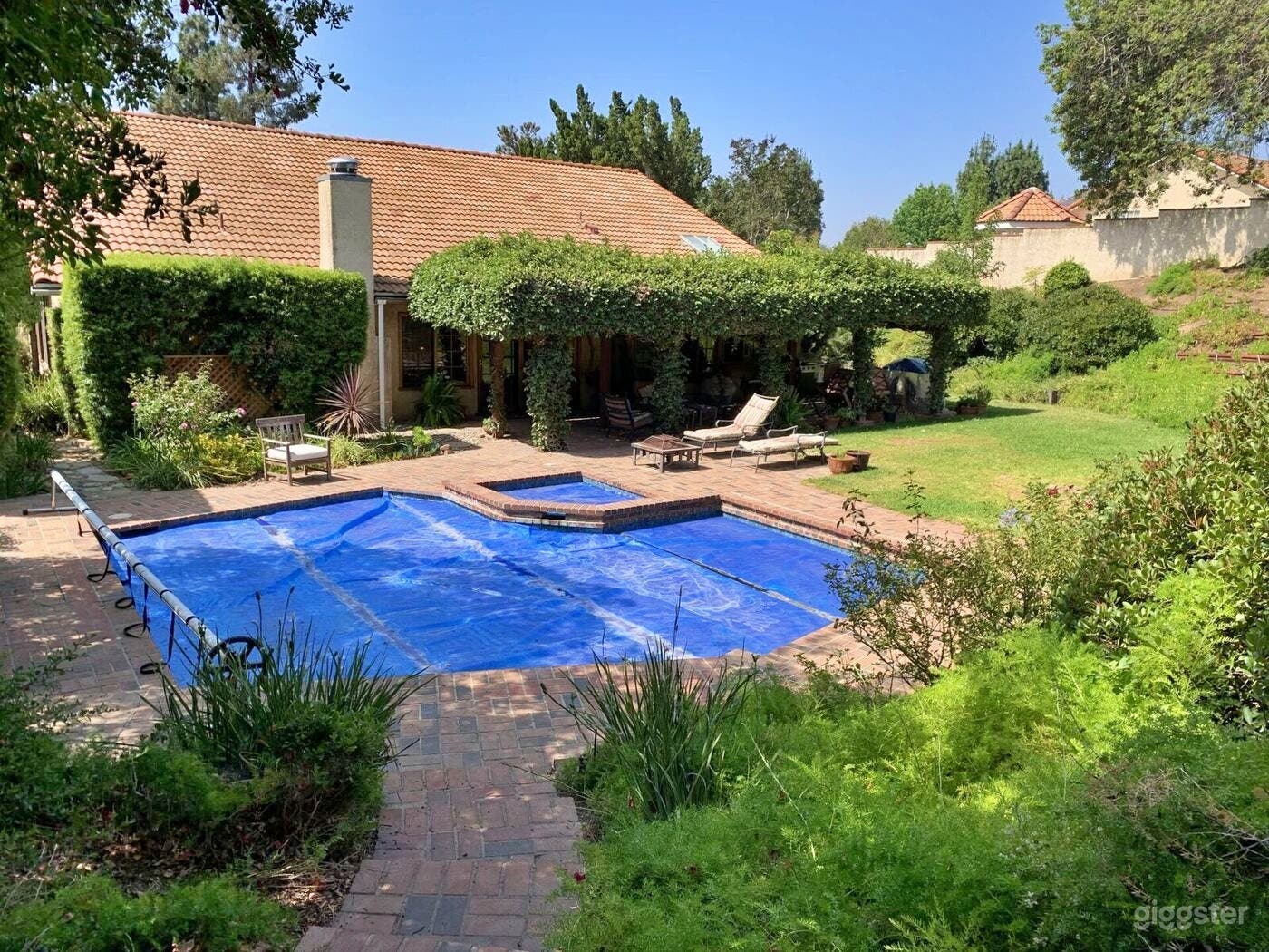 Enchanting Outdoor Pool with Hot tub Photo 1