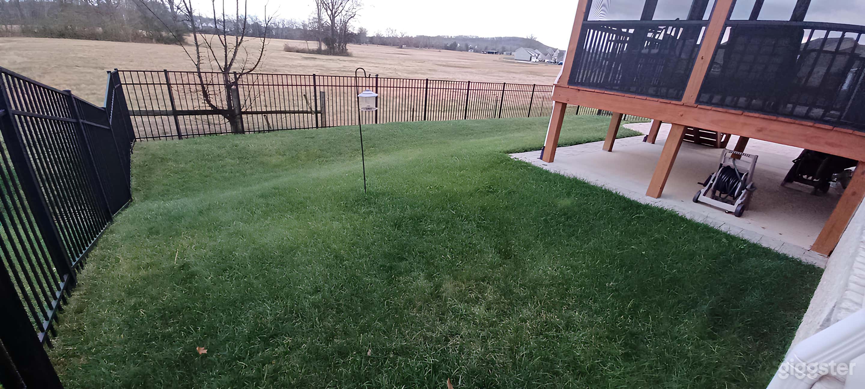 Modern Backyard with Scenic Backdrop Photo 2