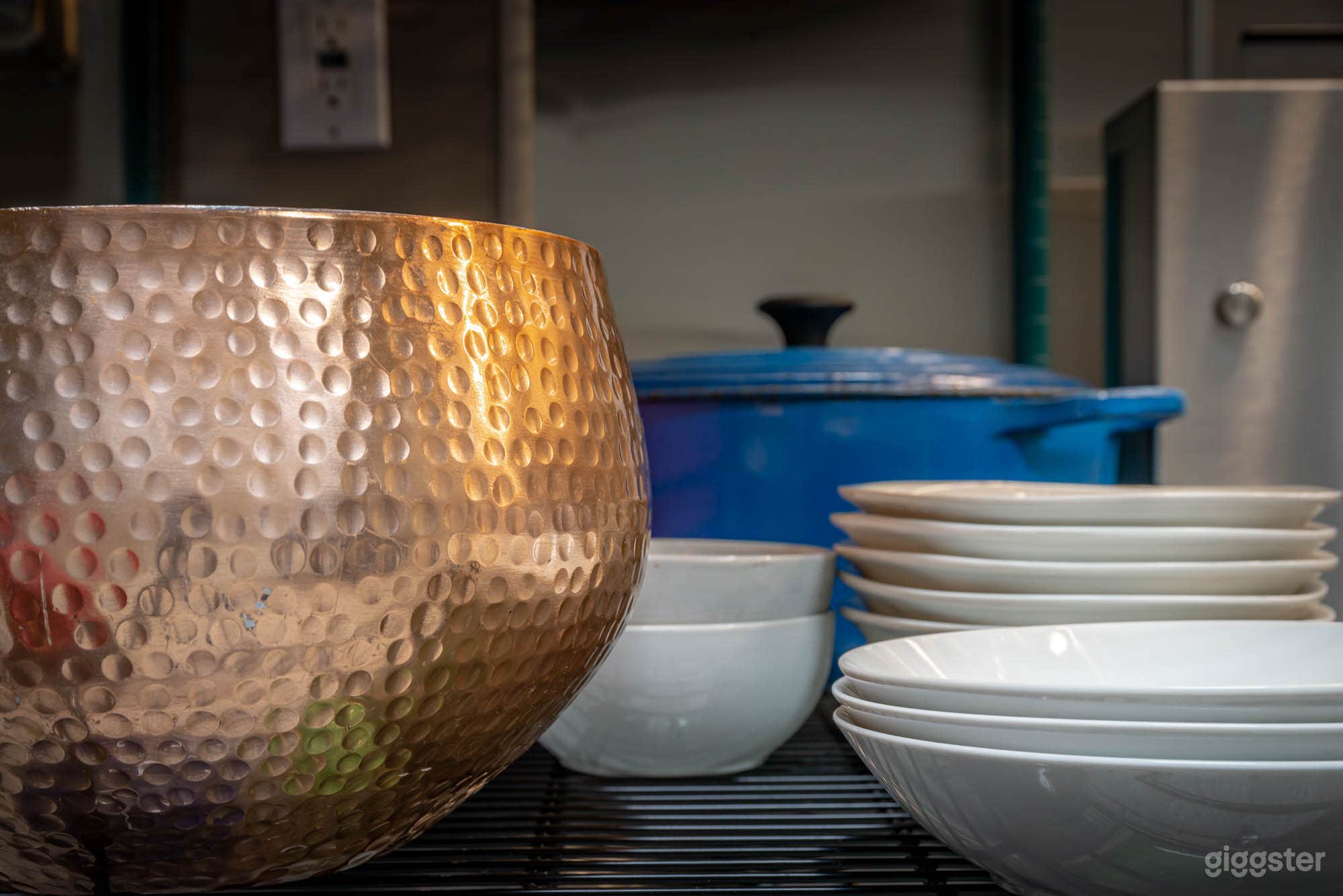 Stocked with plates, bowls, and utensils