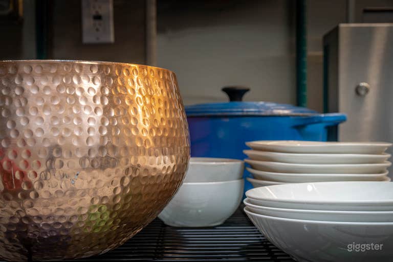  Stocked with plates, bowls, and utensils 