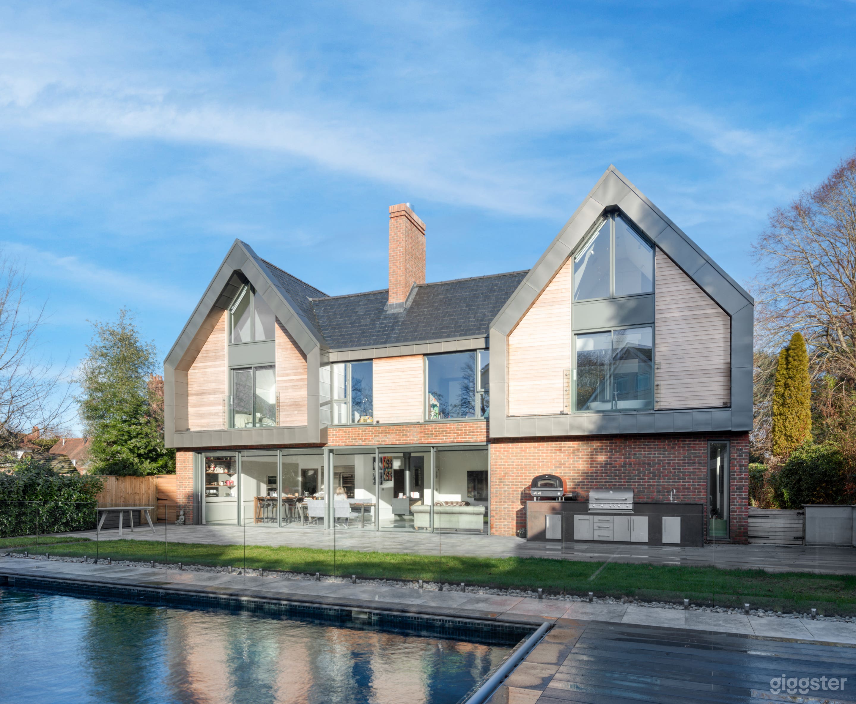 Modern Glass House with Pool Photo 2