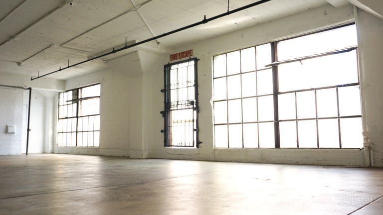  Downtown Studio Loft  Concrete and White Wall  