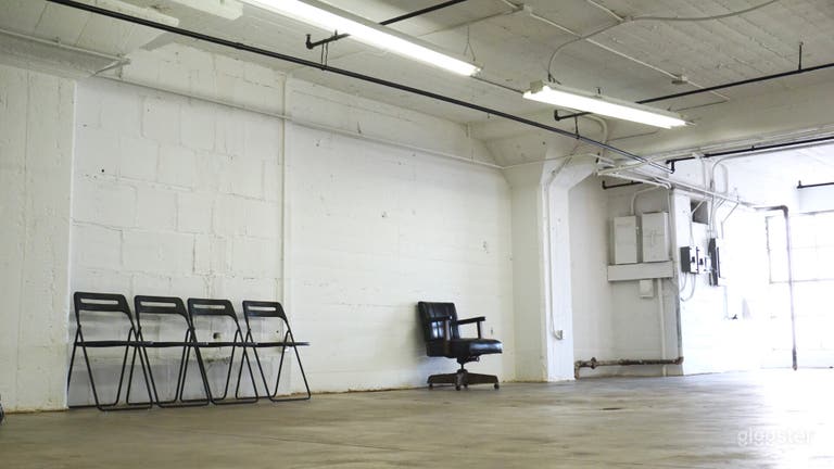  Downtown Studio Loft  Concrete and White Wall  