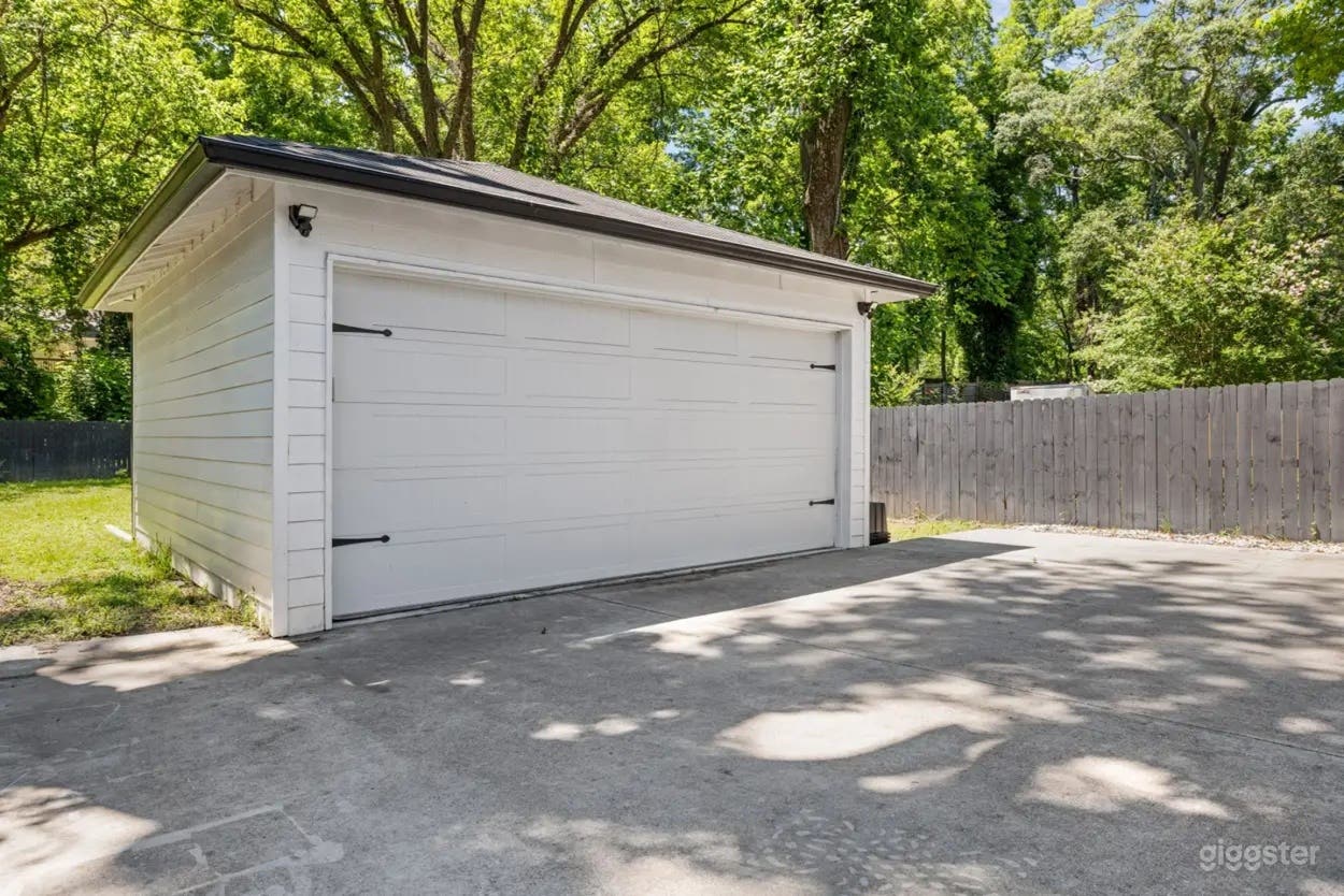 Quiet Green Backyard with Deck and Trees Photo 4