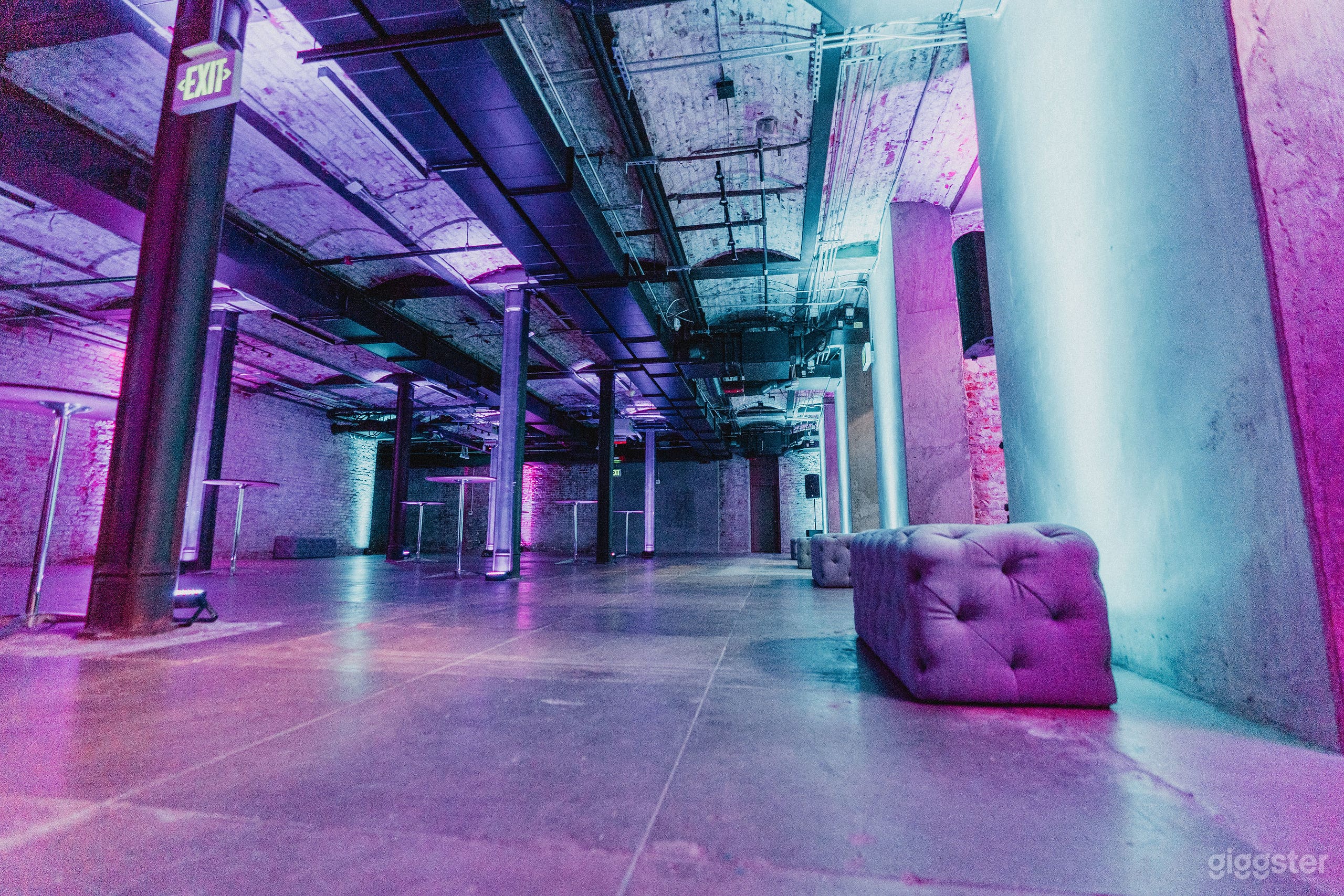 This expansive, industrial-style venue features exposed brick, steel columns, and historic vaults — perfect for immersive, edgy experiences.