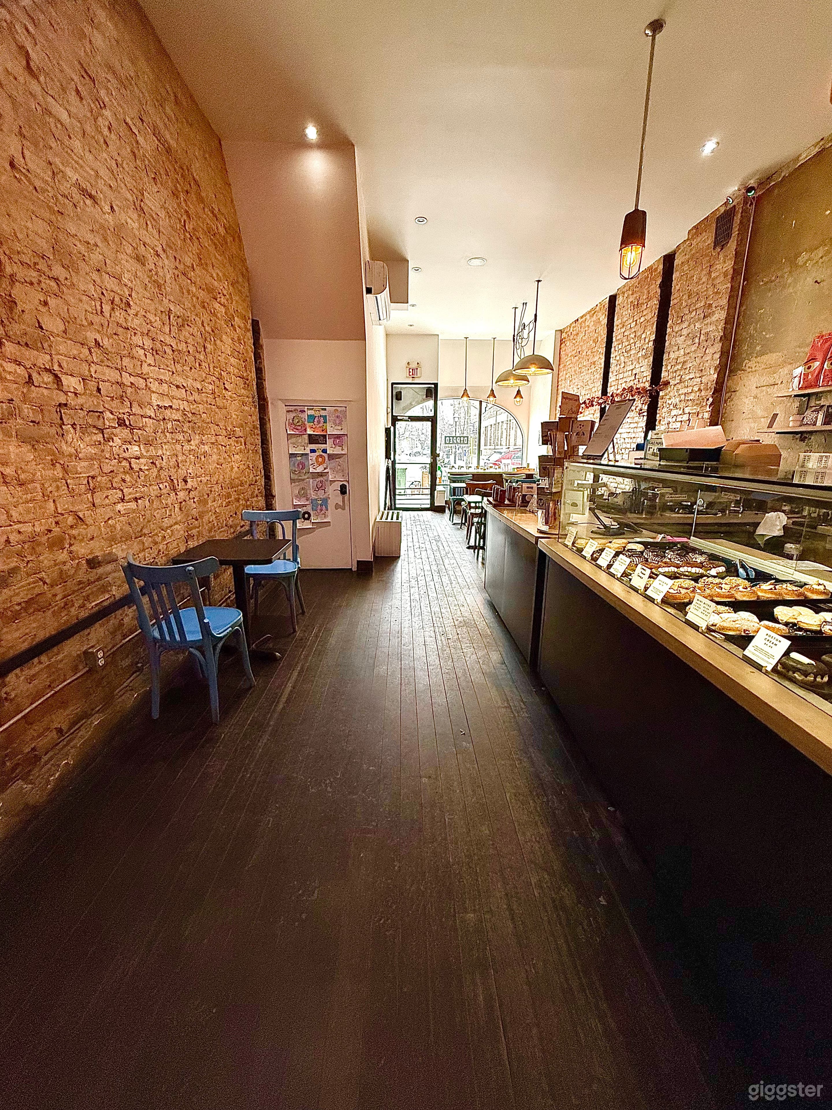 Recent set up - photo from tieback of the store - bakery case and seating and tables are modular 