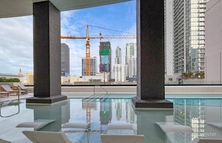  Luxury Rooftop Pool with Skyline Views 