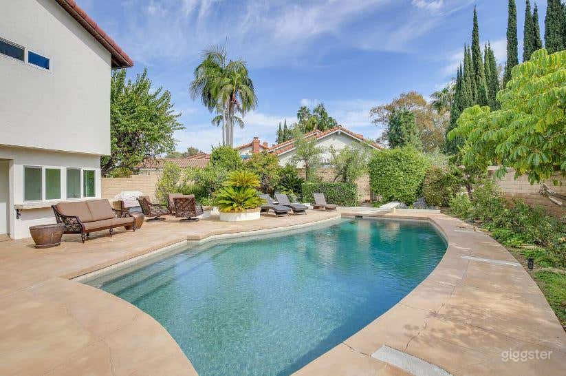 Stunning Backyard Pool on the Luxurious Golf Course Photo 1