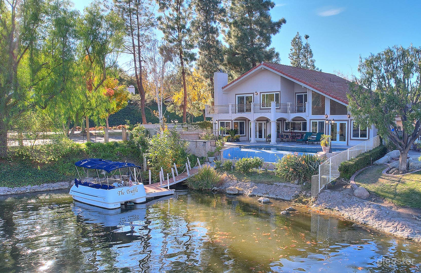 Lakefront privately gated lake view pool spa boat Photo 1