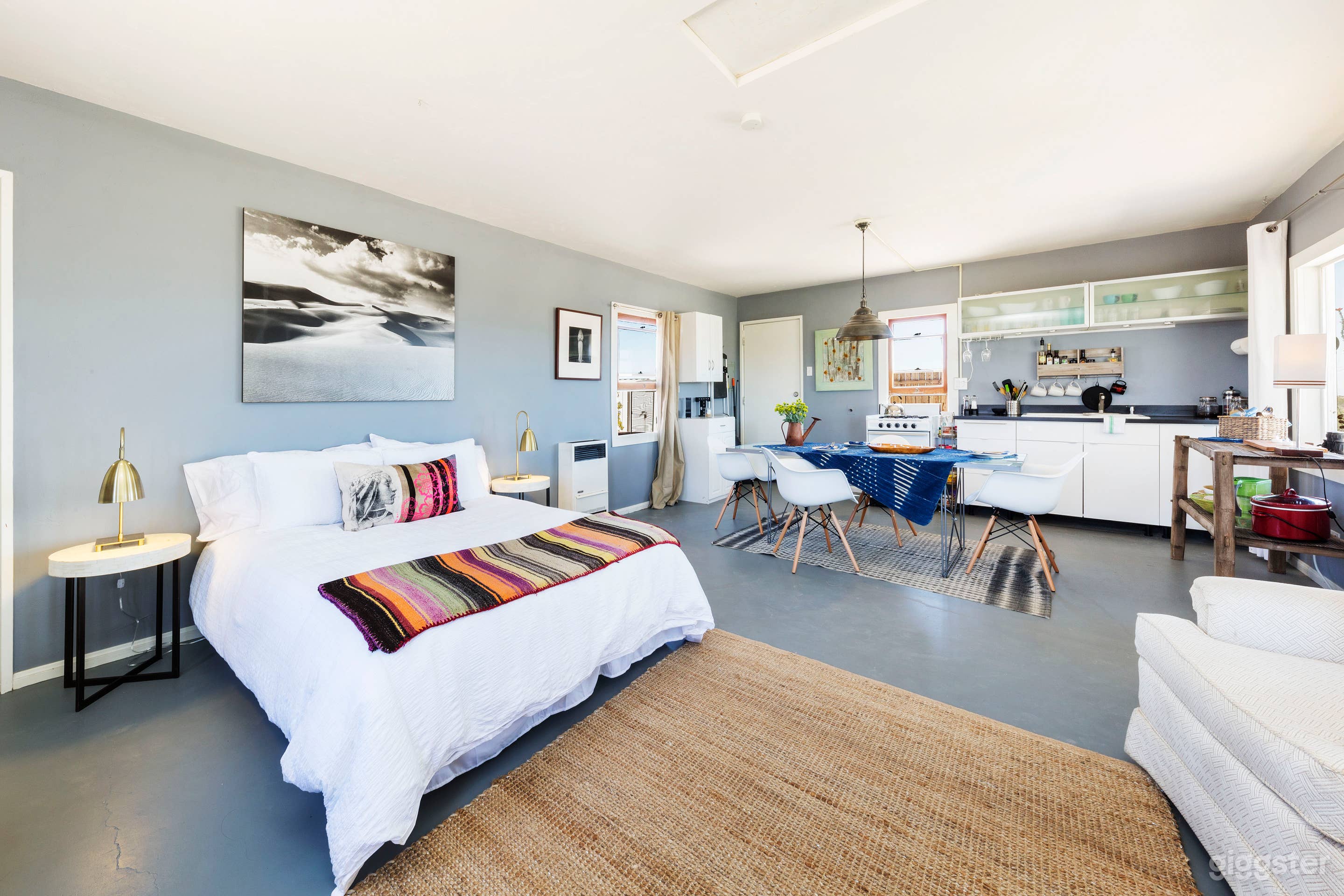 Queen Bed and Dining area