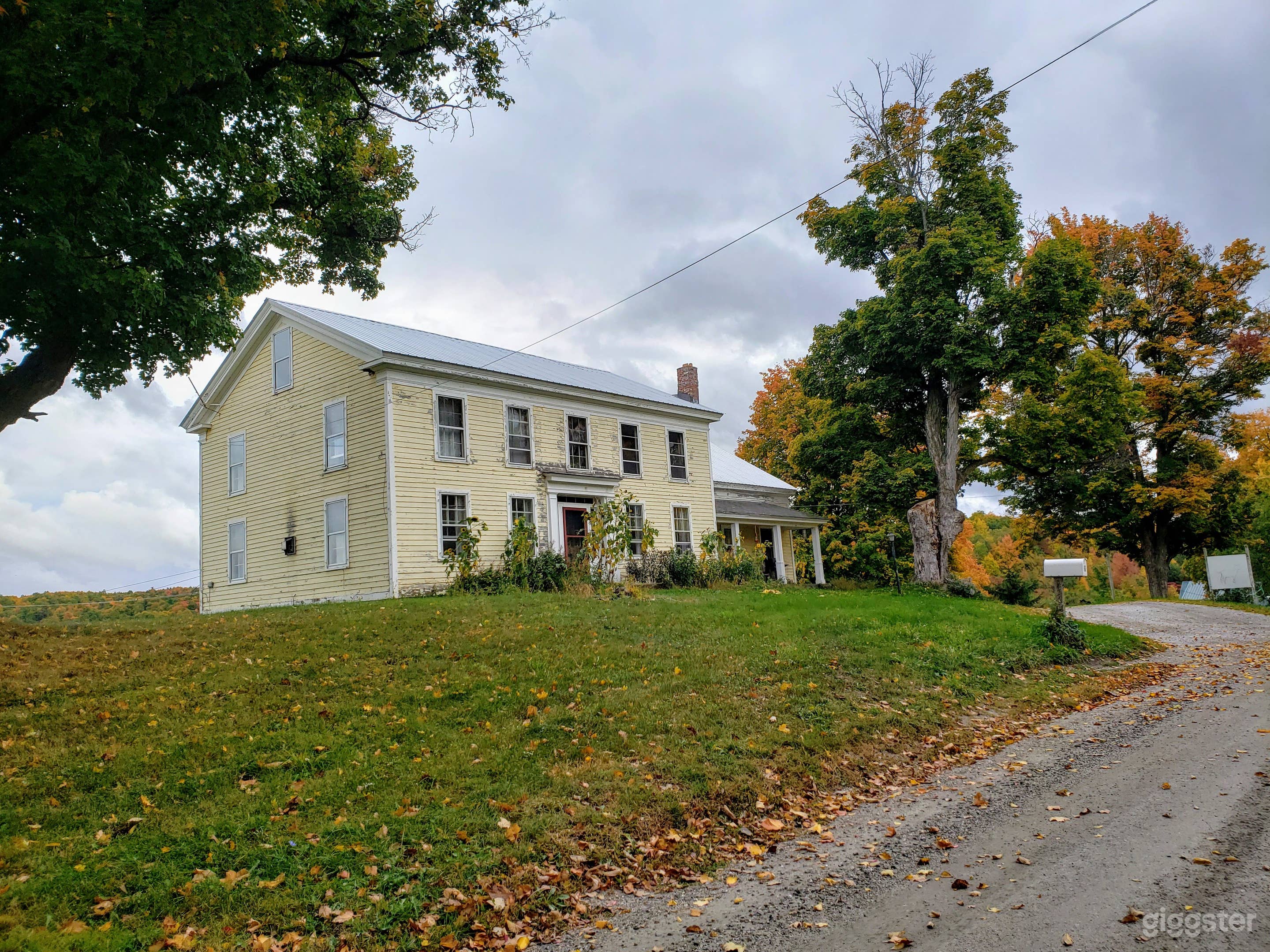 1820's era farmhouse with original windows, doors and detailing, aged paint. Available for exterior shoots only.