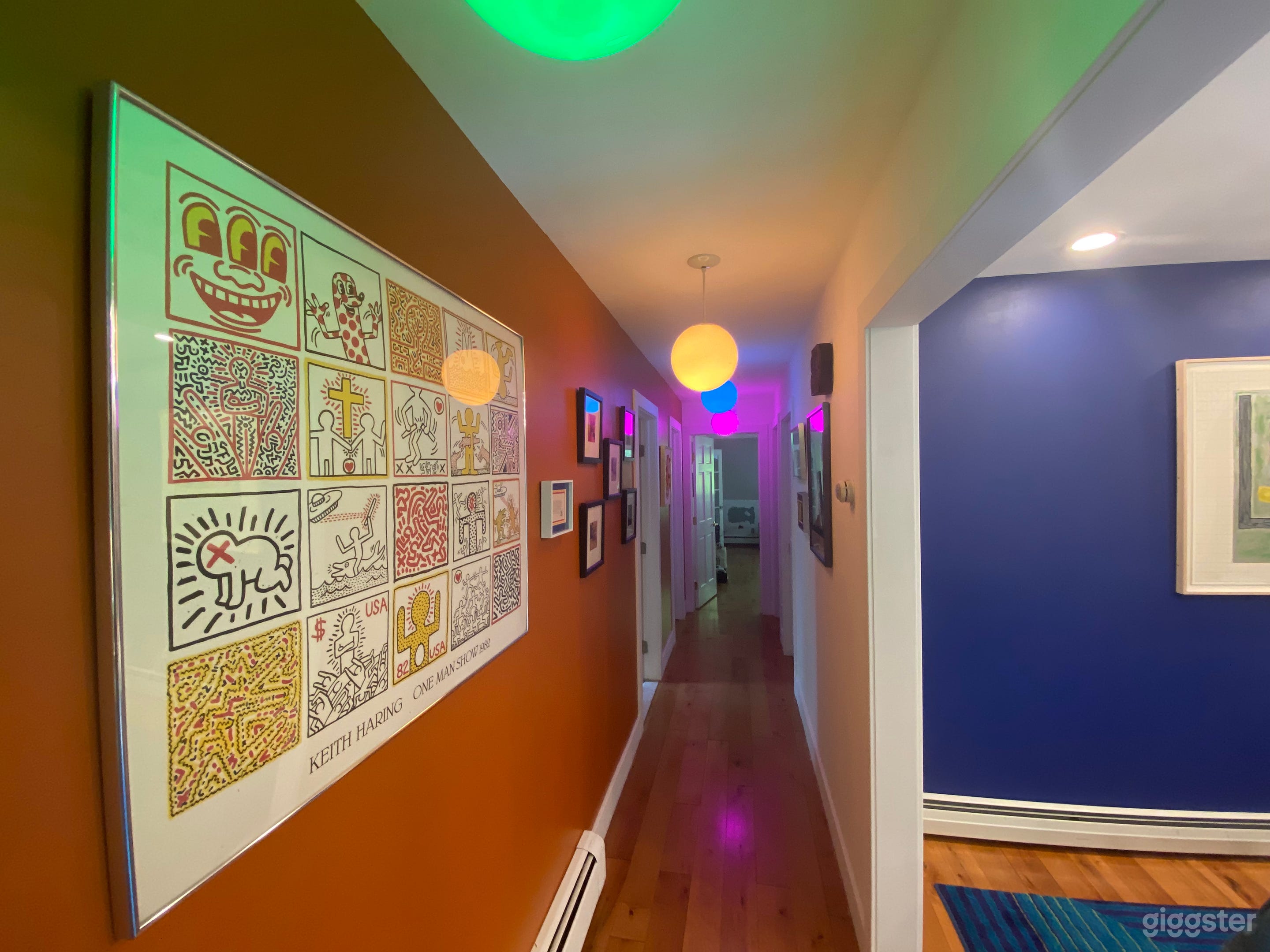 Hallway. Globe lights are Phillips Hue so you can adjust color as needed.