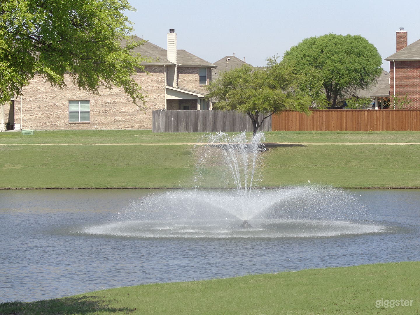 The community lake has five water fountains.