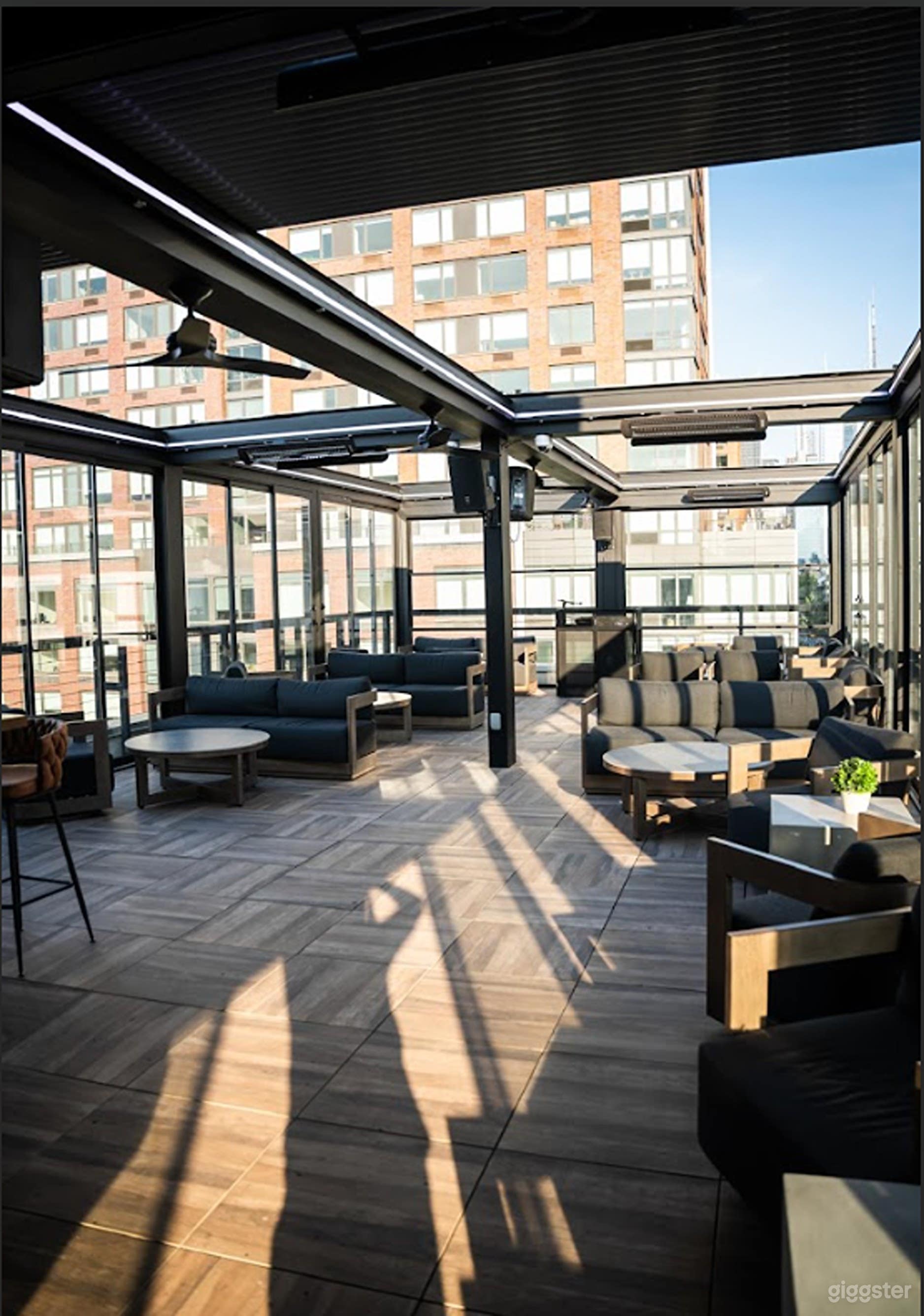 High-Energy Rooftop Cocktail Bar Photo 1