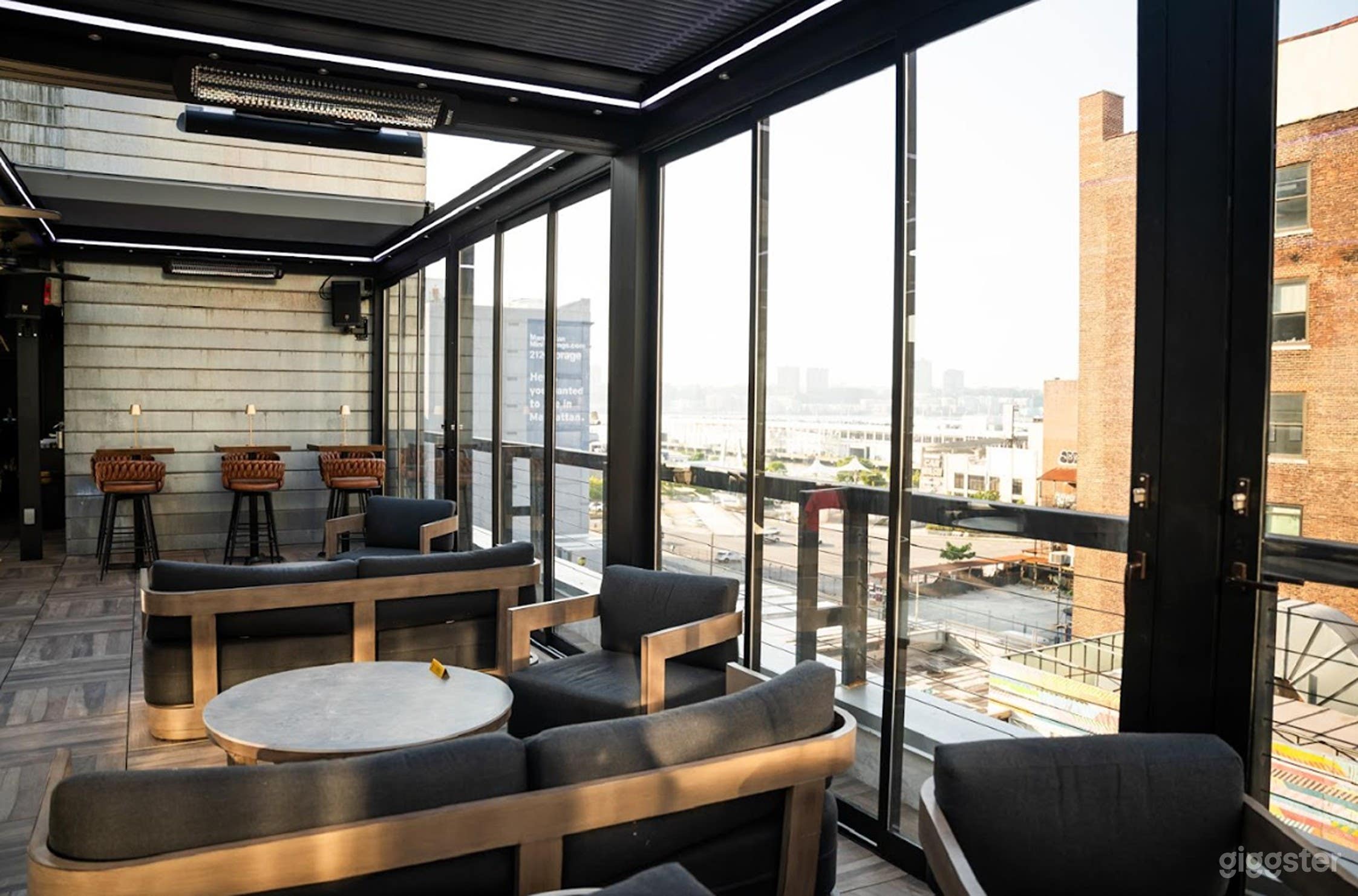 High-Energy Rooftop Cocktail Bar Photo 3