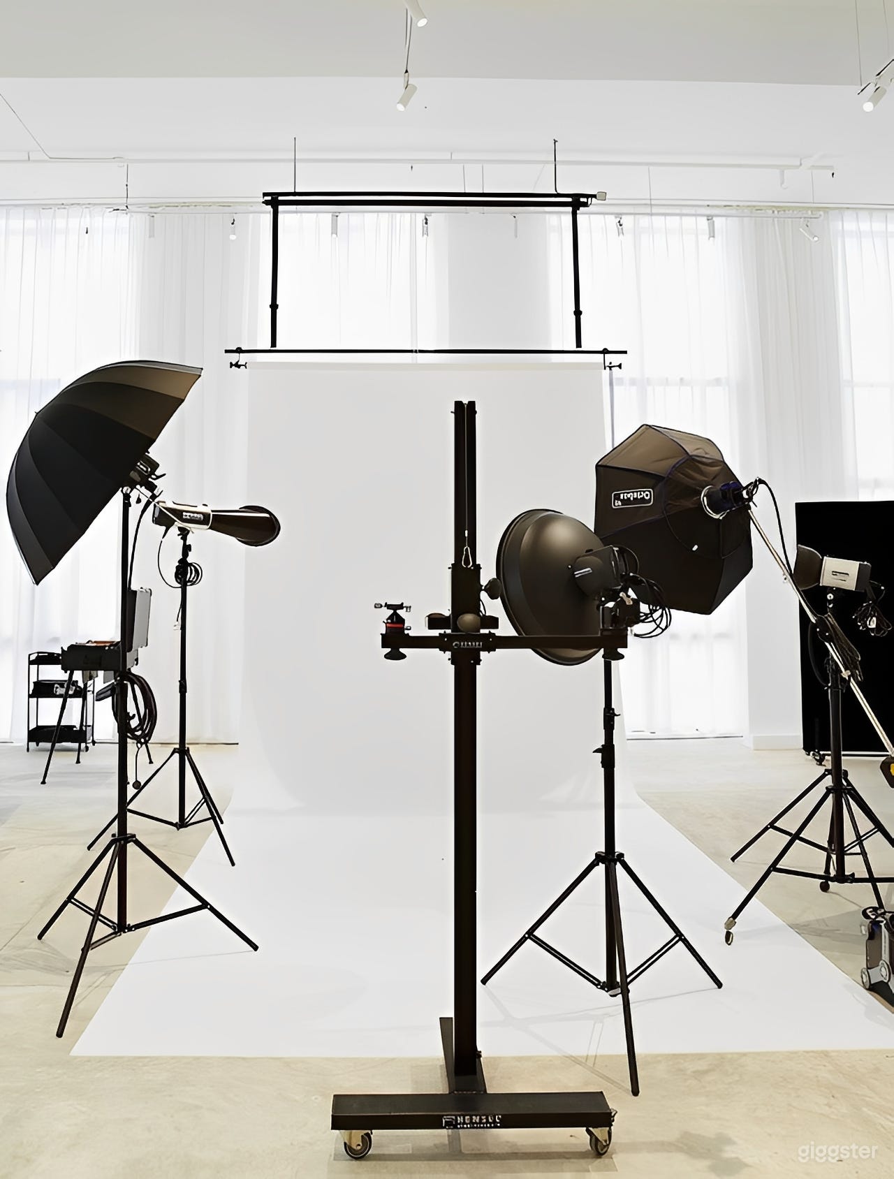 Light-Filled Minimalist White Studio Photo 1