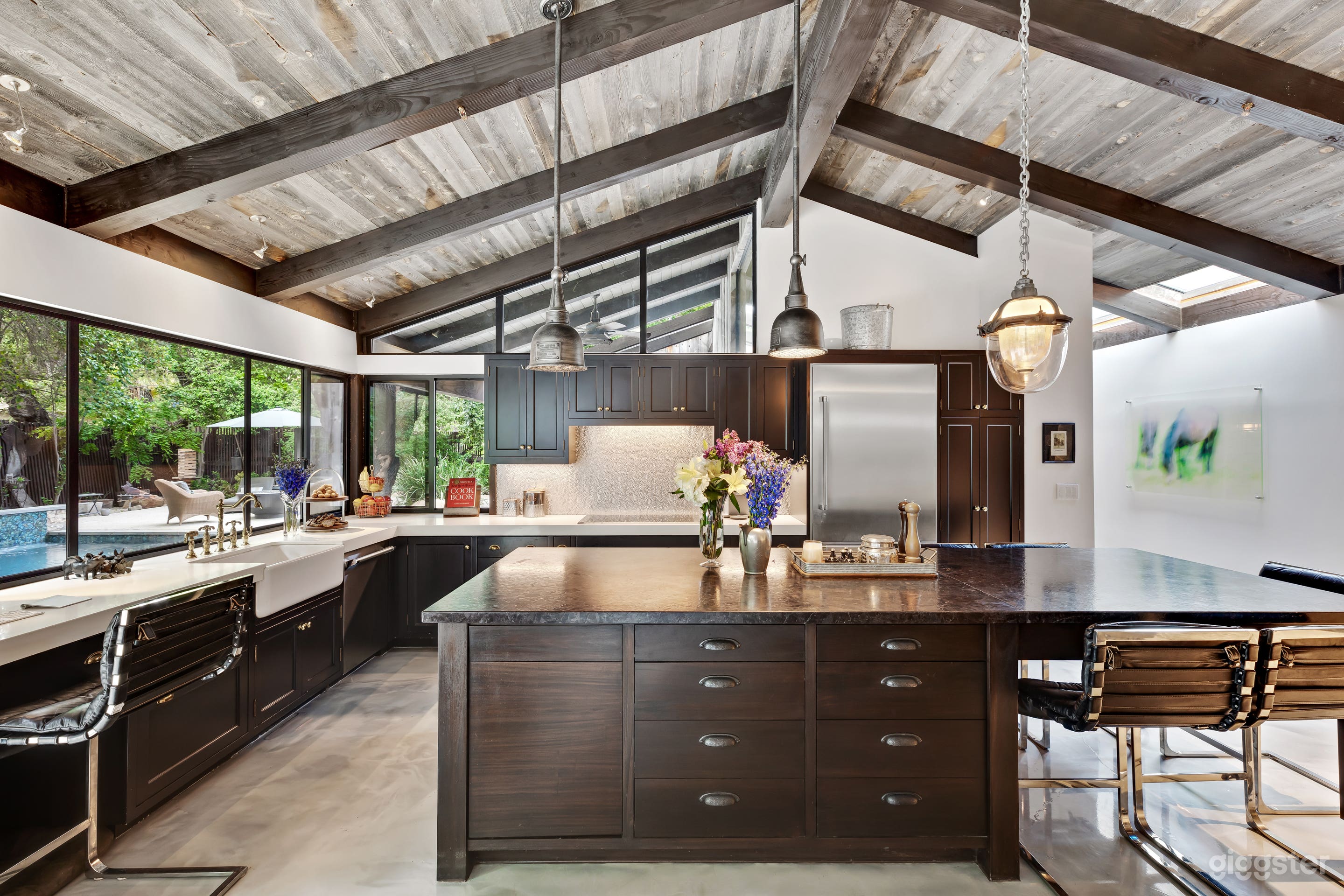 Kitchen leads into pool area