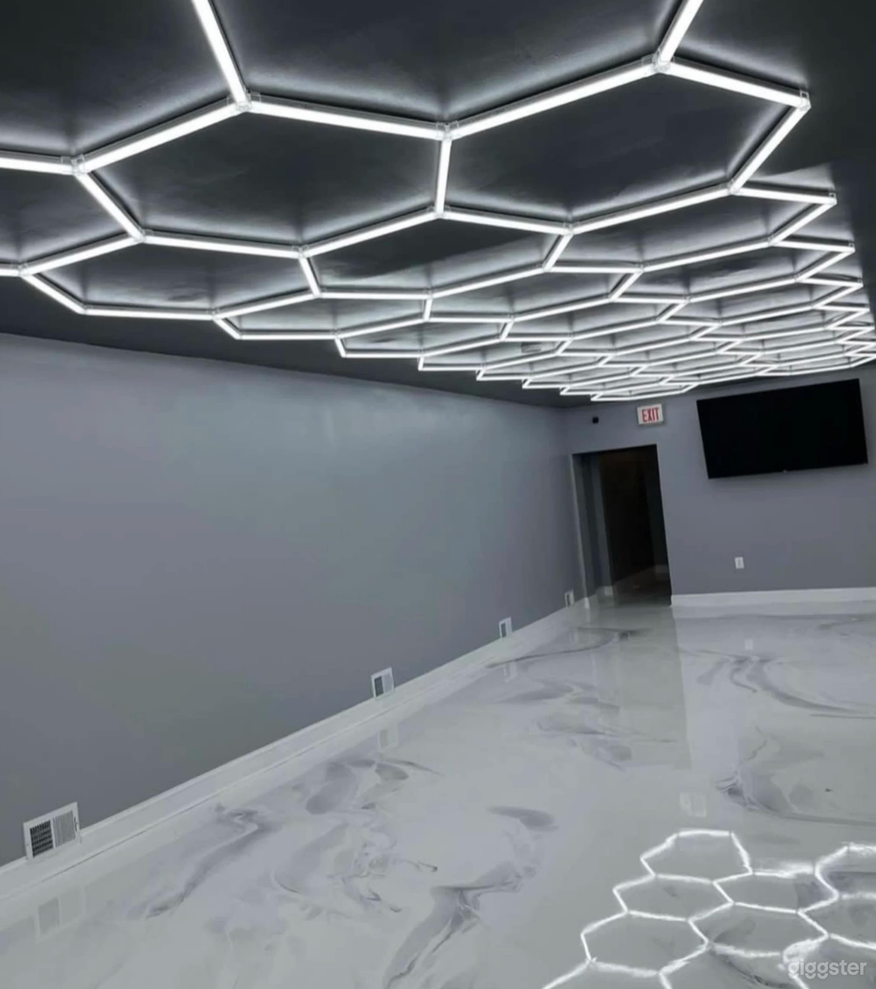 Modern Two-Story Event Space Sleek Epoxy Flooring Photo 1