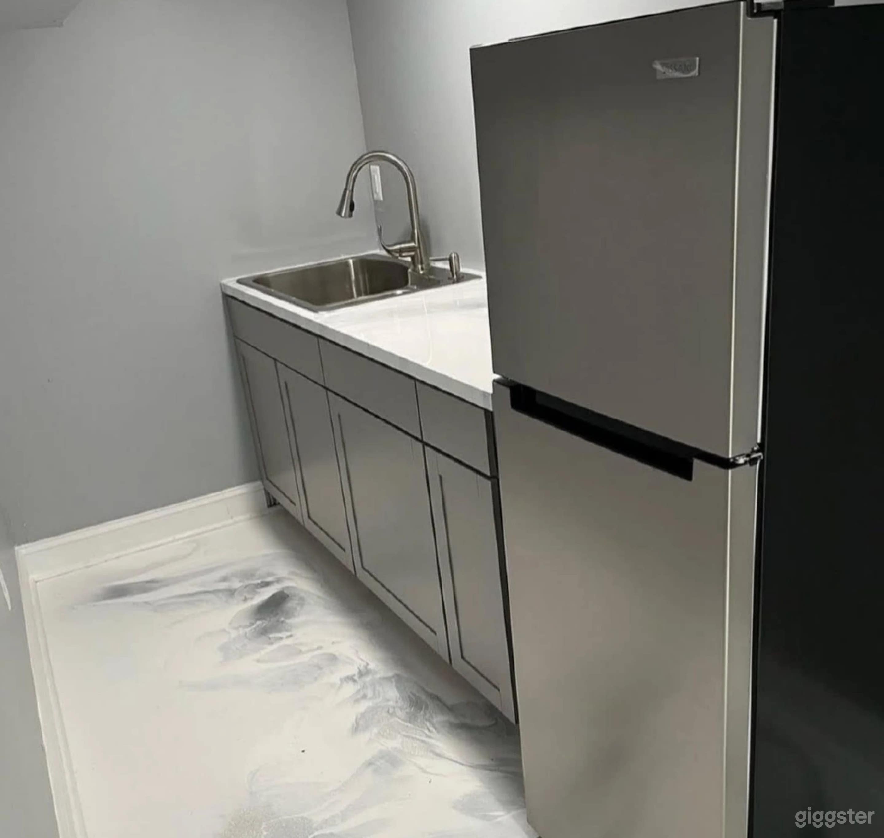 Modern Two-Story Event Space Sleek Epoxy Flooring Photo 3