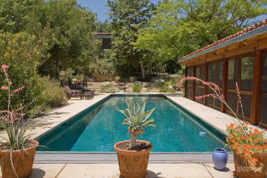 pool with view of house