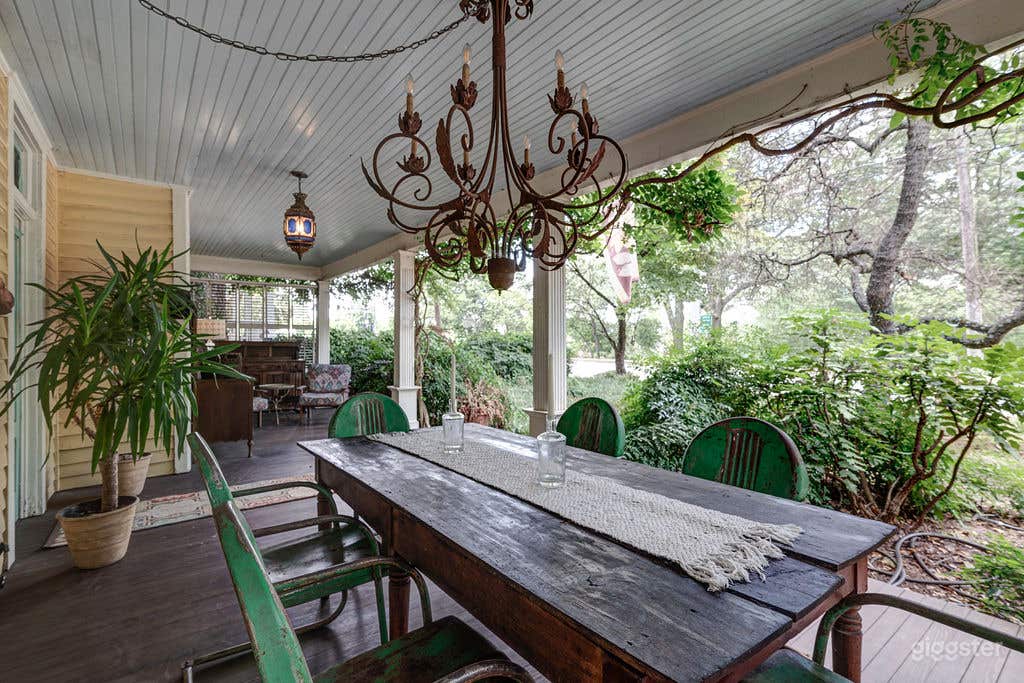 Front porch. There's a story behind that chandelier.