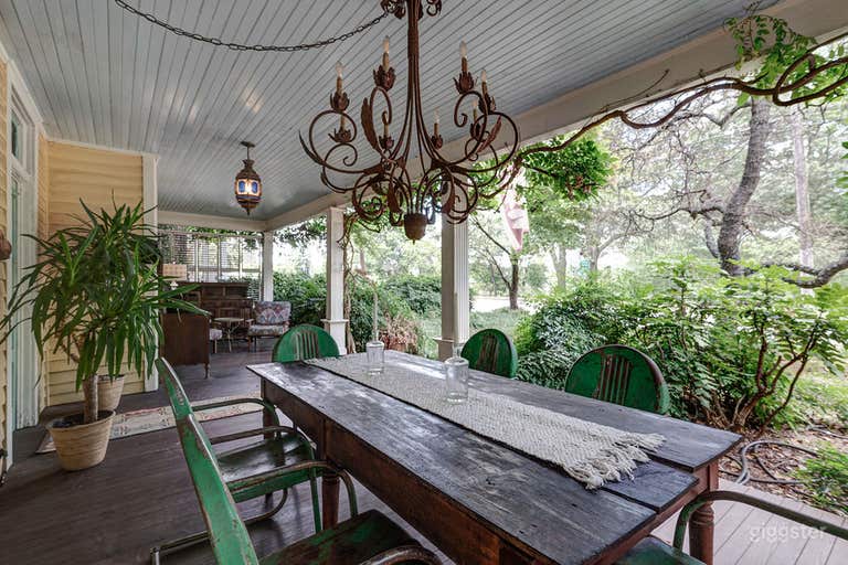  Front porch. There&#x27;s a story behind that chandelier. 