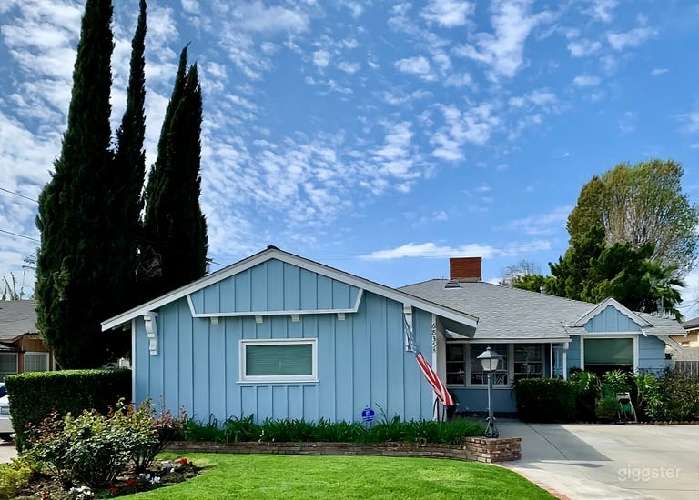  Sunny Backyard with Orange Tree 