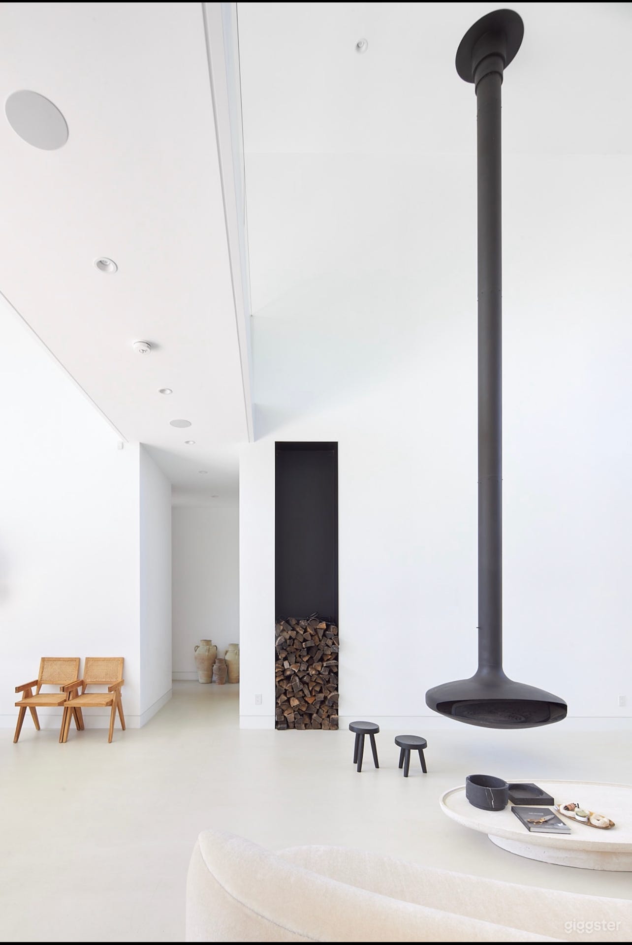 Suspended fireplace 23’ high