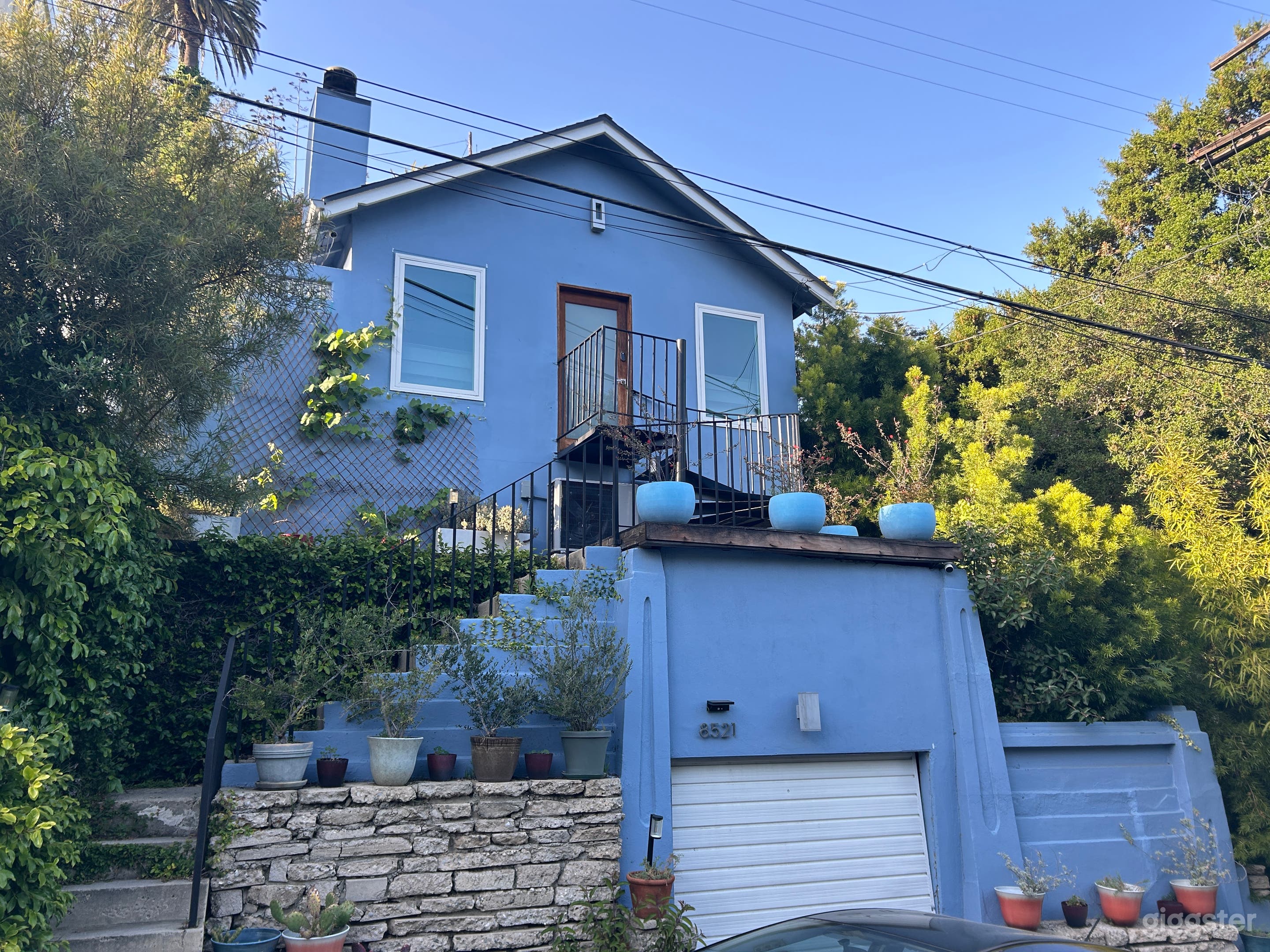Welcome to my home! Built in 1924, this former hunting lodge has been converted into a mid-century Hollywood Hills Bungalow.