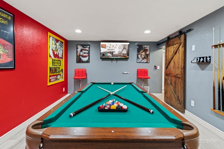  Pool Table ft. TVa Cue up the entertainment with a pool table that doubles as a  TV center, ensuring every game is played to the backdrop of your favorite shows and movies. 