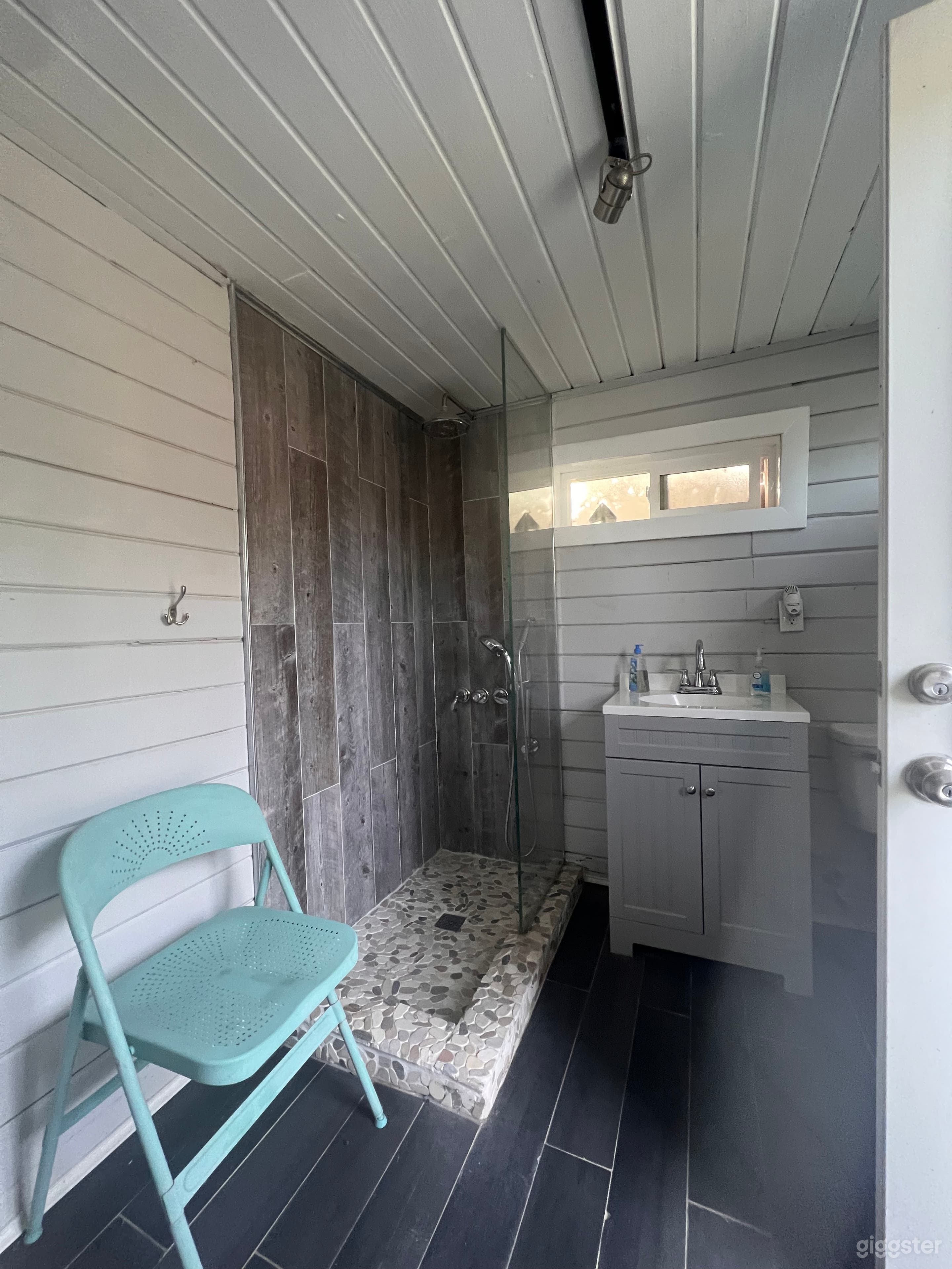 Pool bathroom detached from both houses 