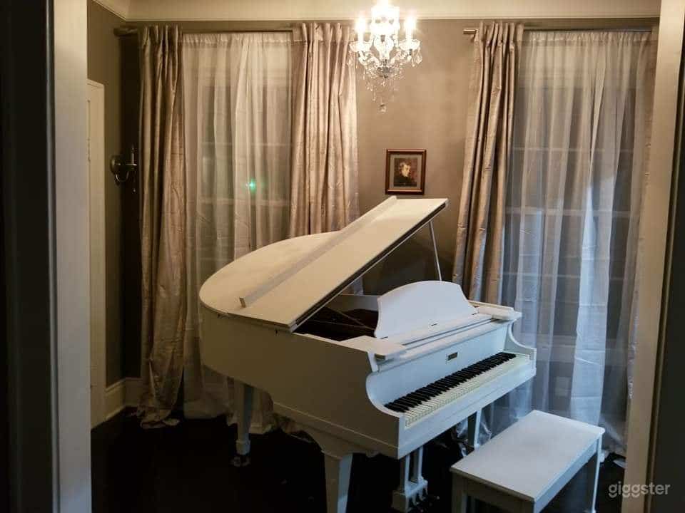 White baby grand Piano