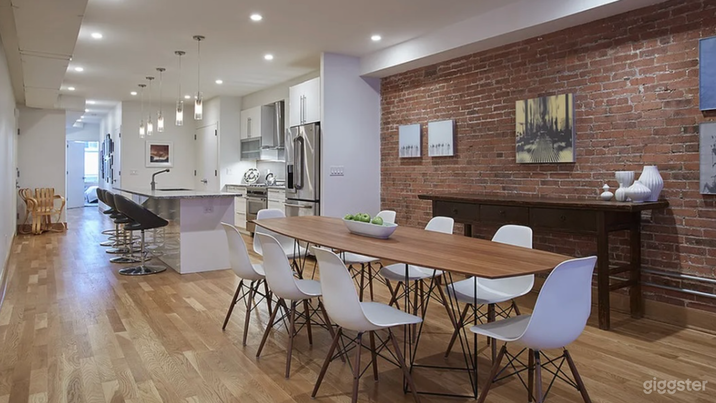 Huge 52' of expansive open living, dining and kitchen entertaining area. Furnished with a large dining table, comfortable lounge and bar area.  Furniture can easily be moved. Owner is very accomodating.