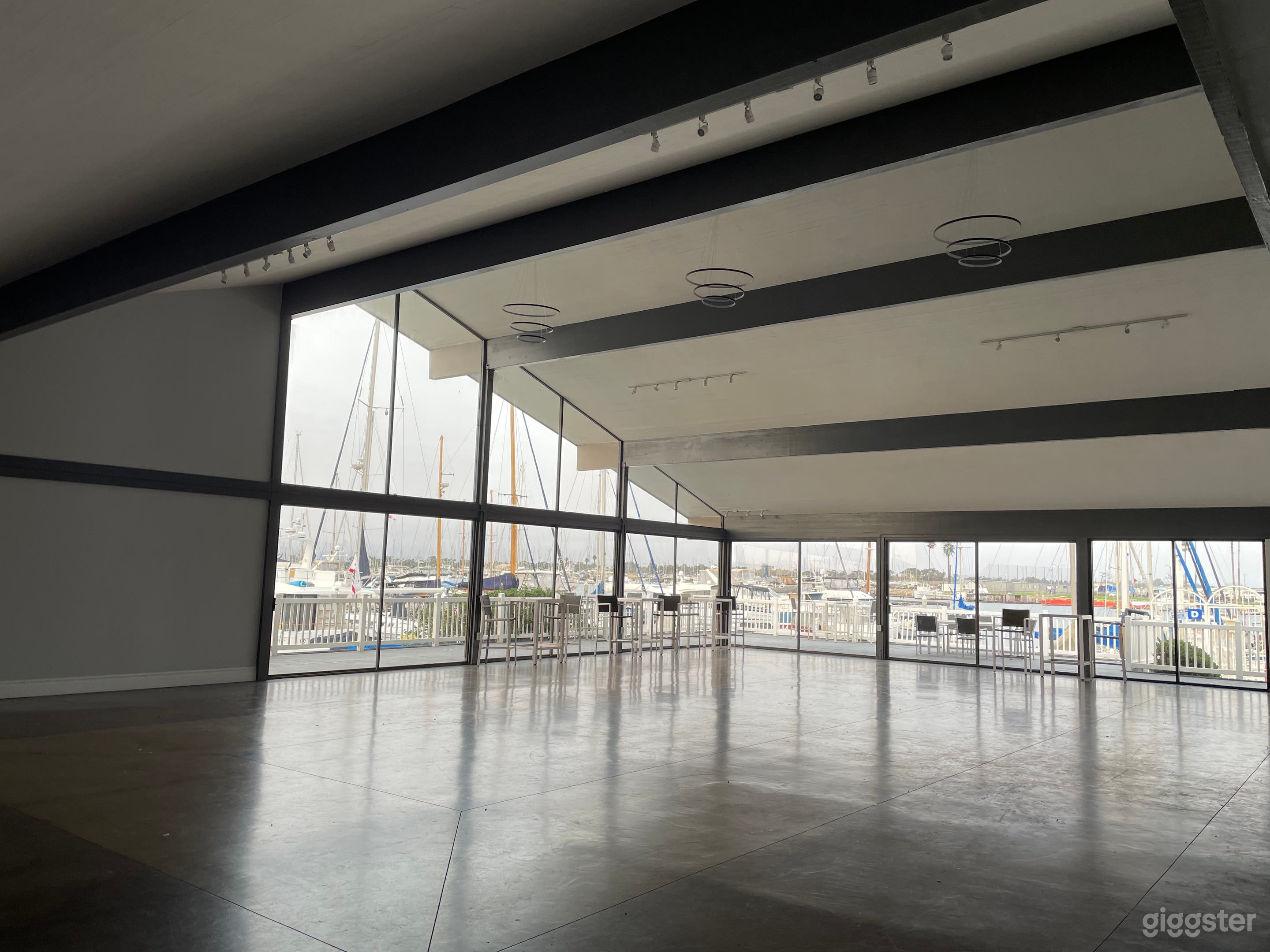 The view from the inside of the clubhouse. Some of the doors can be opened for easy access to the deck and patio area.