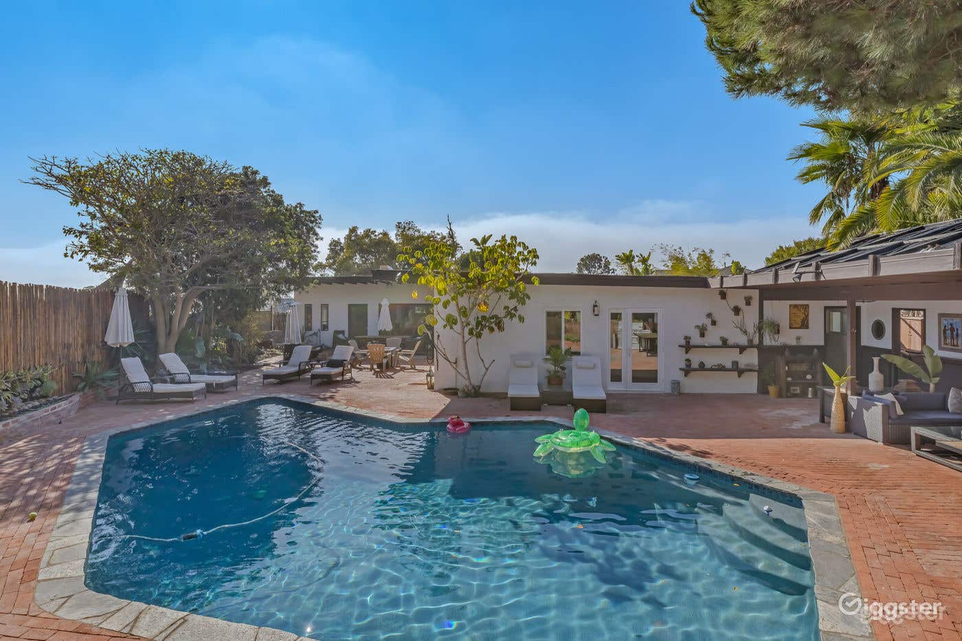 Tropical Outdoor Pool + Nature Photo 1