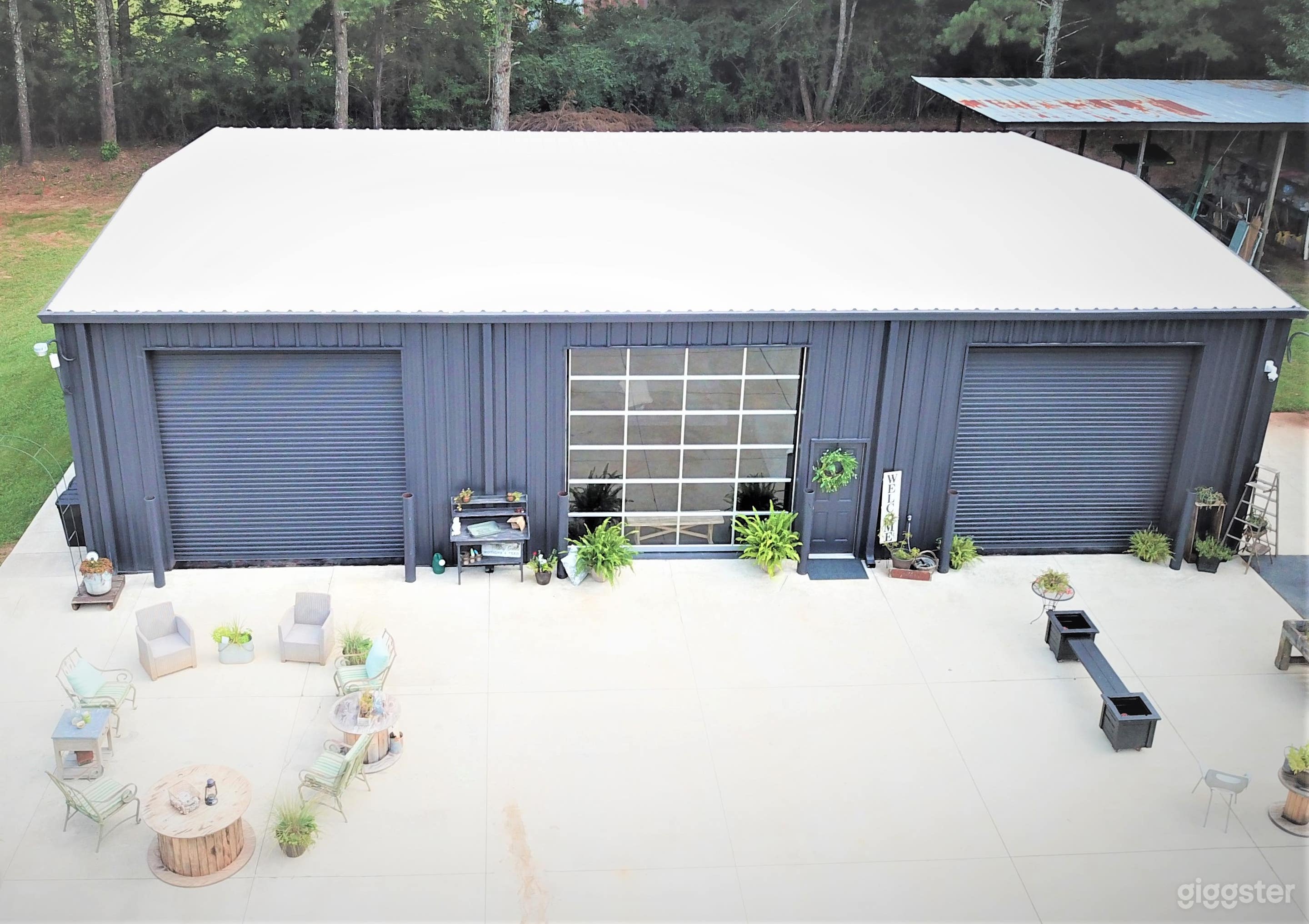 Outdoor Entrance of Studio Warehouse.  The 2 doors on the left open to create large indoor / outdoor space for entertaining.