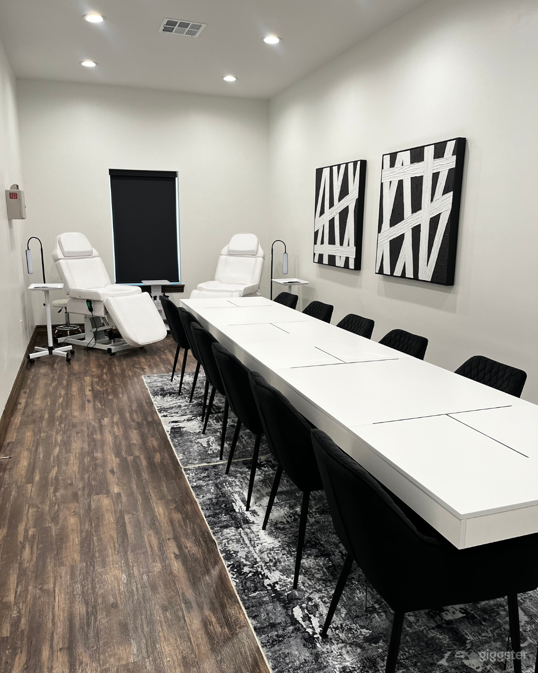 Small Conference Room - Seats 12 with 2 remote adjustable spa beds. 55 inch flat screen available for mirroring and HDMI connection. Acrylic podium available.