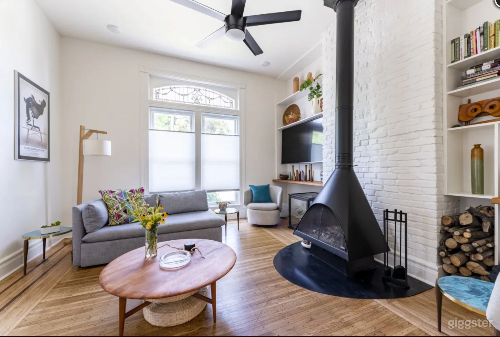 Living Room with working 60's Fireplace and Victorian Stained Glass.  Built-in bookshelves all custom
